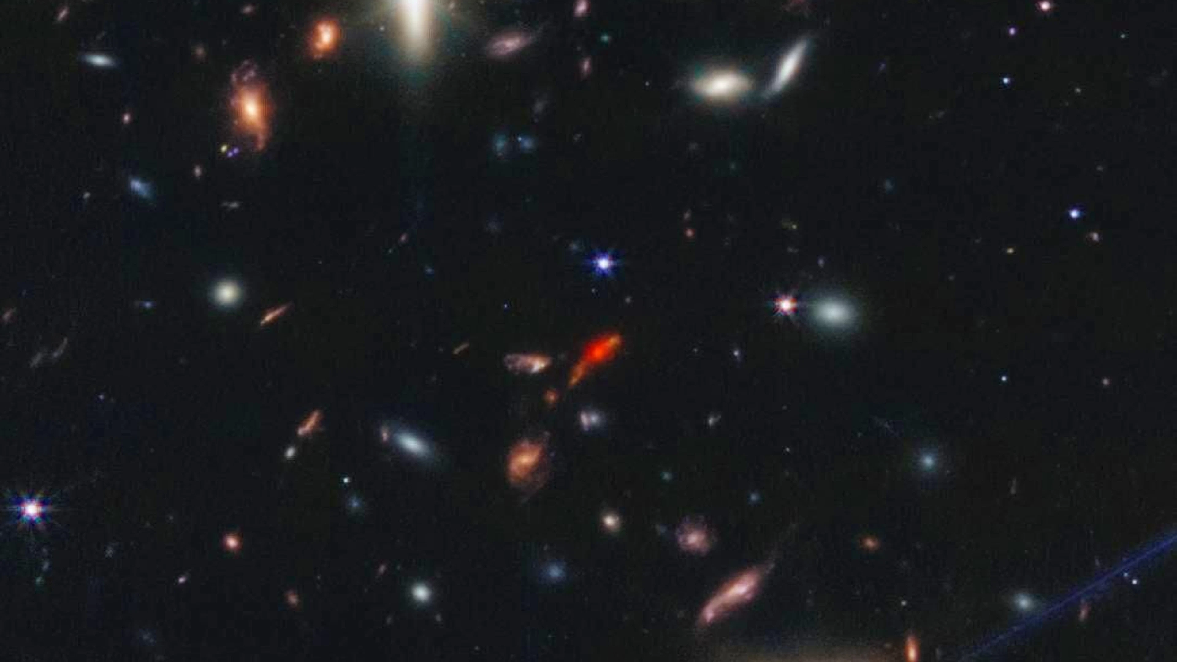 ... entweder eine Galaxie sein, die sehr weit entfernt ist oder aber es könnte eine Galaxie sein, in der es noch viel Sternformation gibt.»