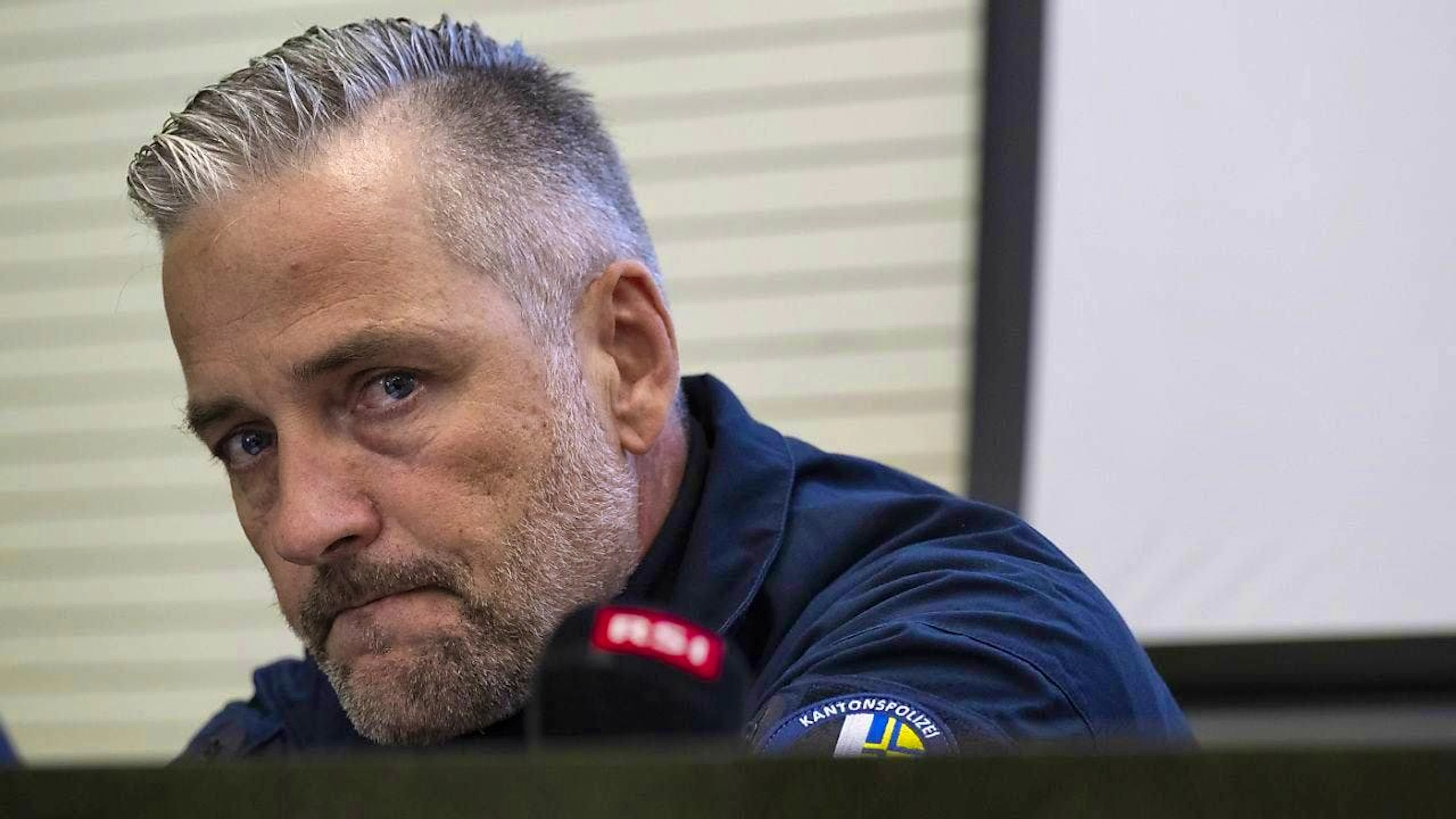 The commander of the Graubünden cantonal police provided information about the situation in the Misox Valley on Saturday morning. (KEYSTONE/Ti-Press/Alessandro Crinari)