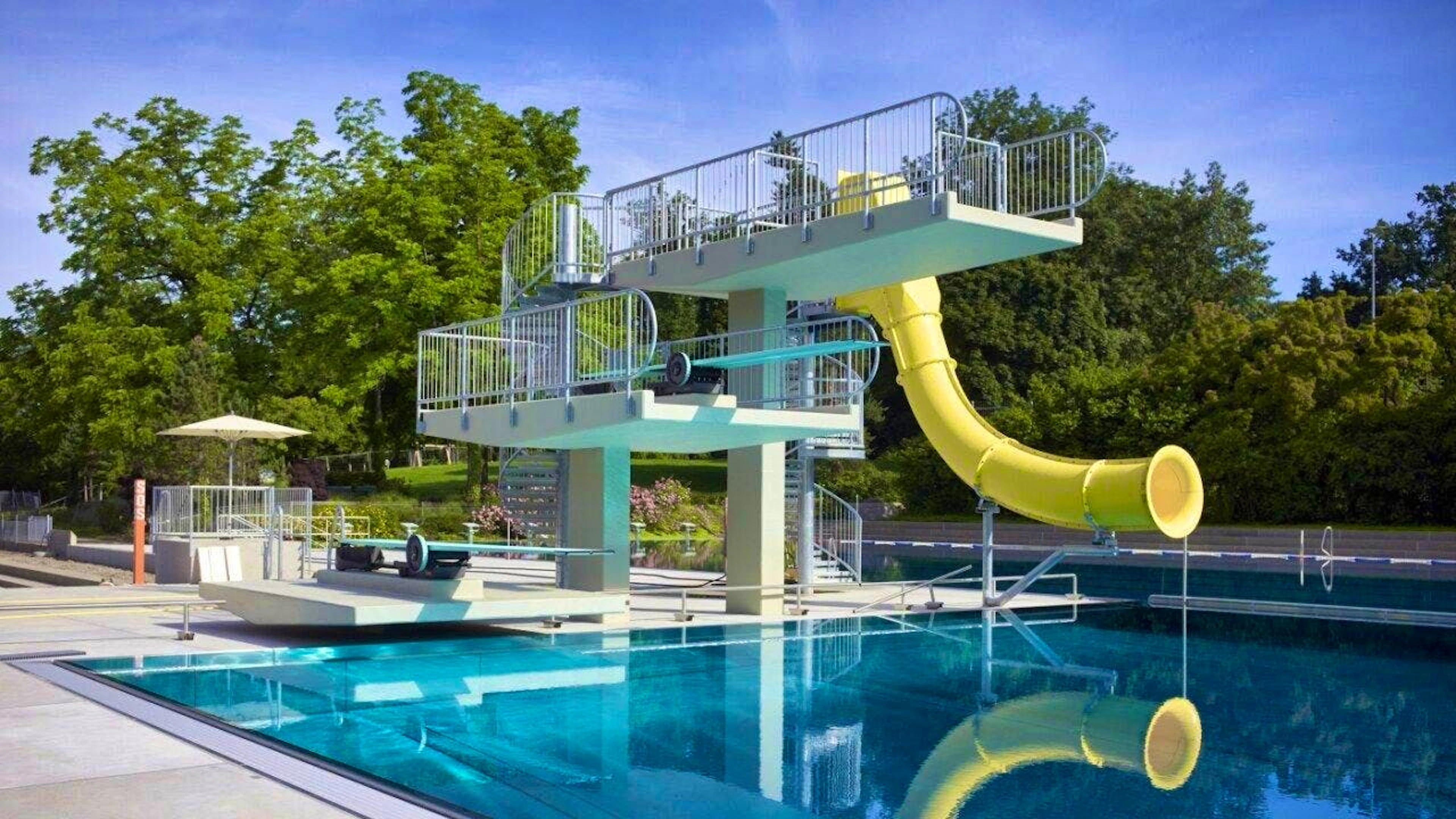 The Wyler outdoor pool reopens on Wednesday. One of the new features: A renovated diving tower with Crazy Jump slide.