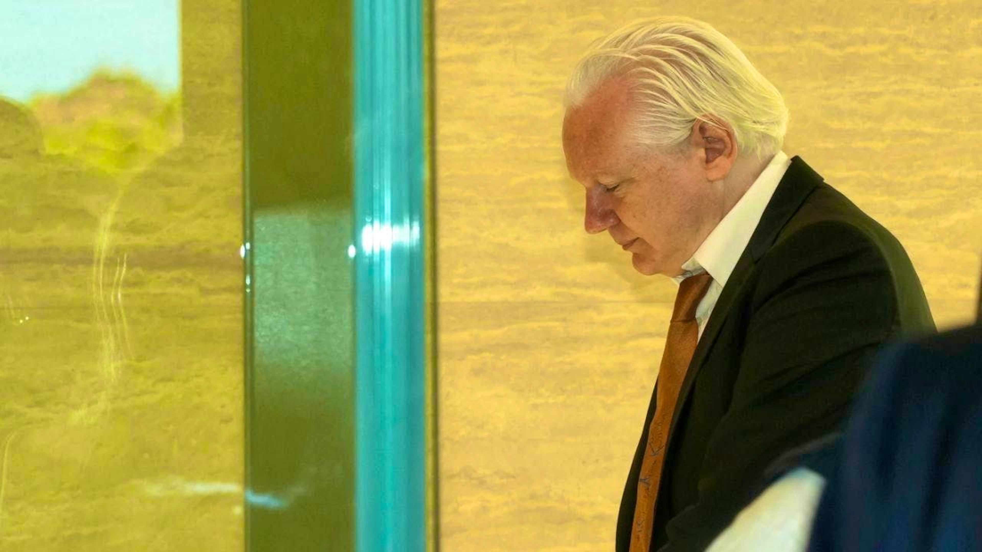 WikiLeaks founder Julian Assange arrives at the United States courthouse on Saipan. Photo: Eugene Hoshiko/AP