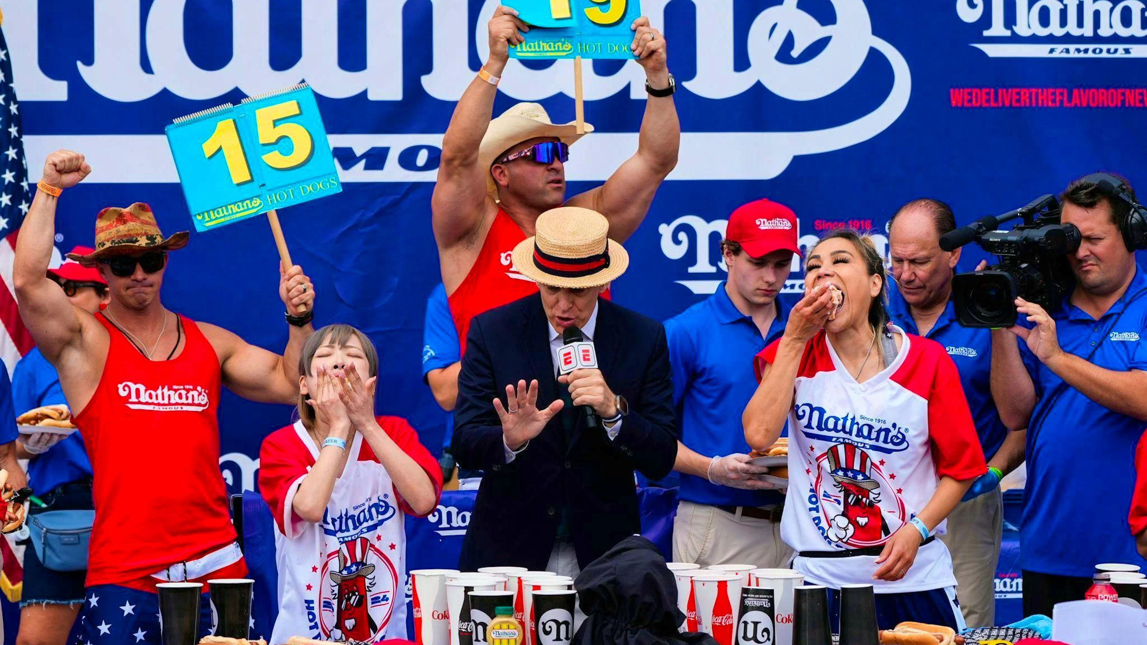 In the women's category, defending champion Miki Sudo (right) managed 51 hot dogs.