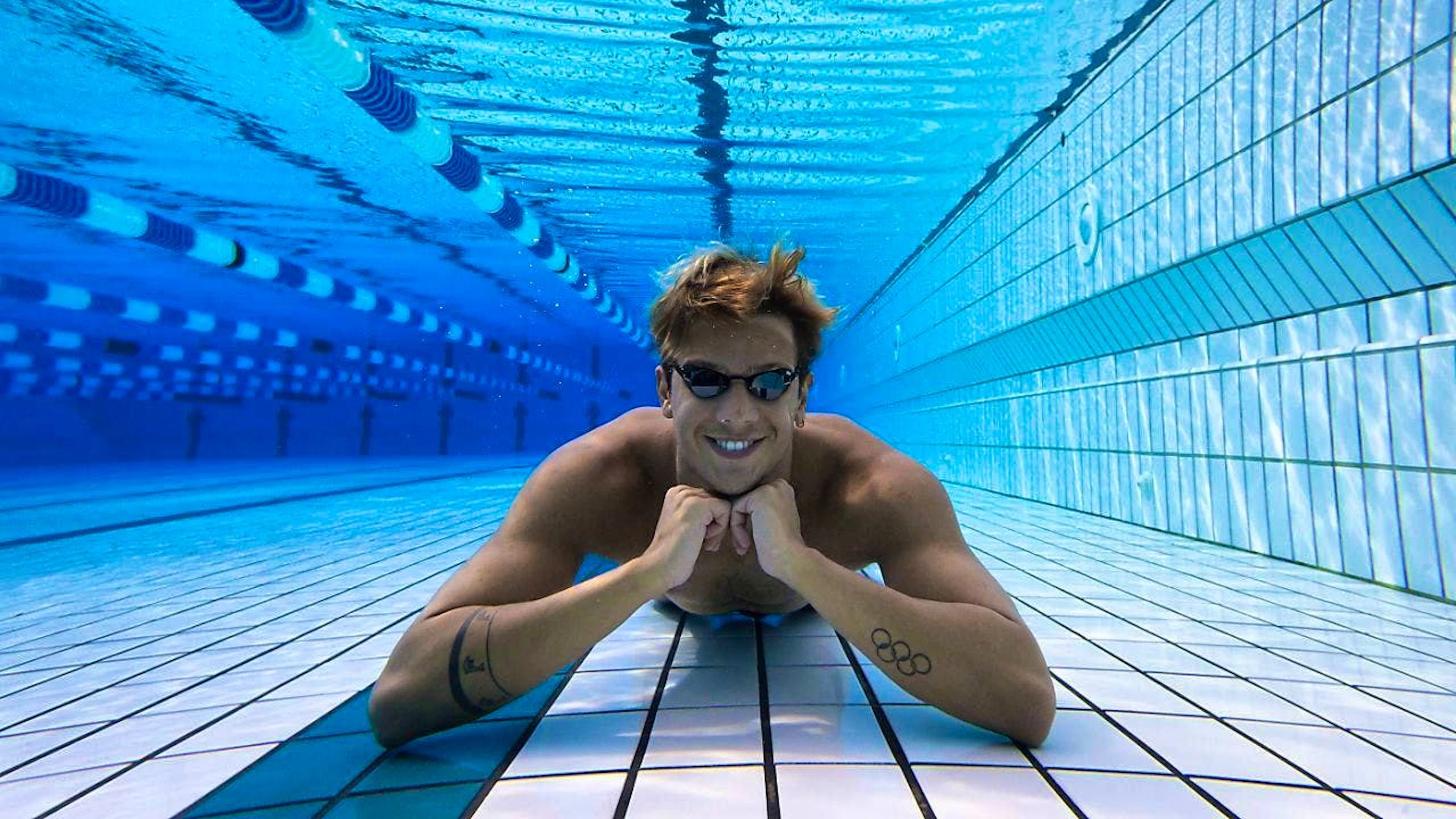 Ponti smiles in his pool in Tenero