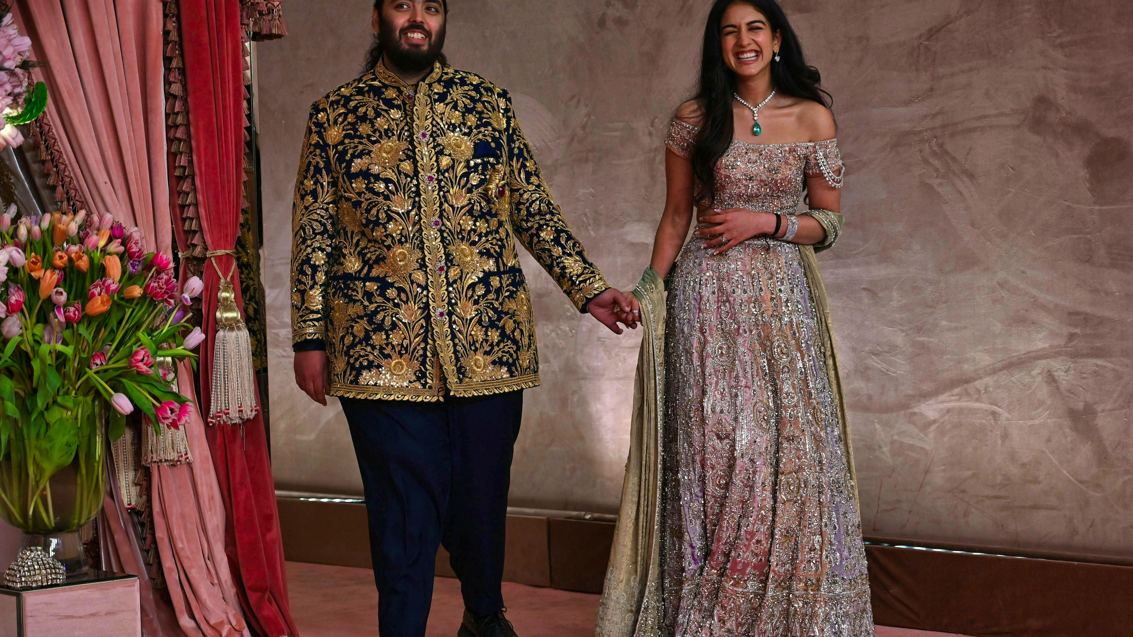 Anant Ambani and Radhika Merchant during a ceremony on July 5, 2024 in Mumbai, India.