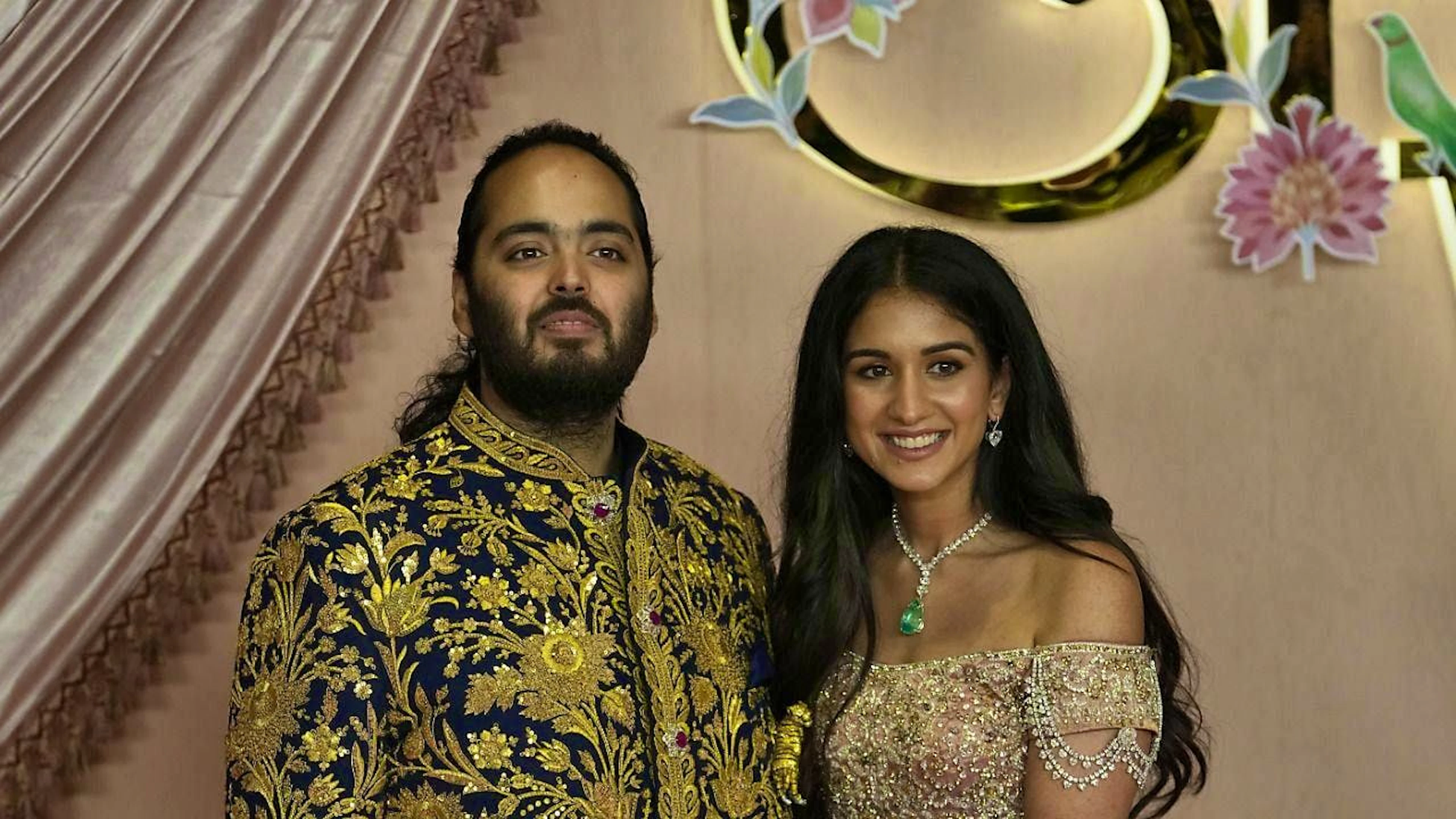The happy couple: Anant Ambani and Radhika Merchant tie the knot in Mumbai on Friday.