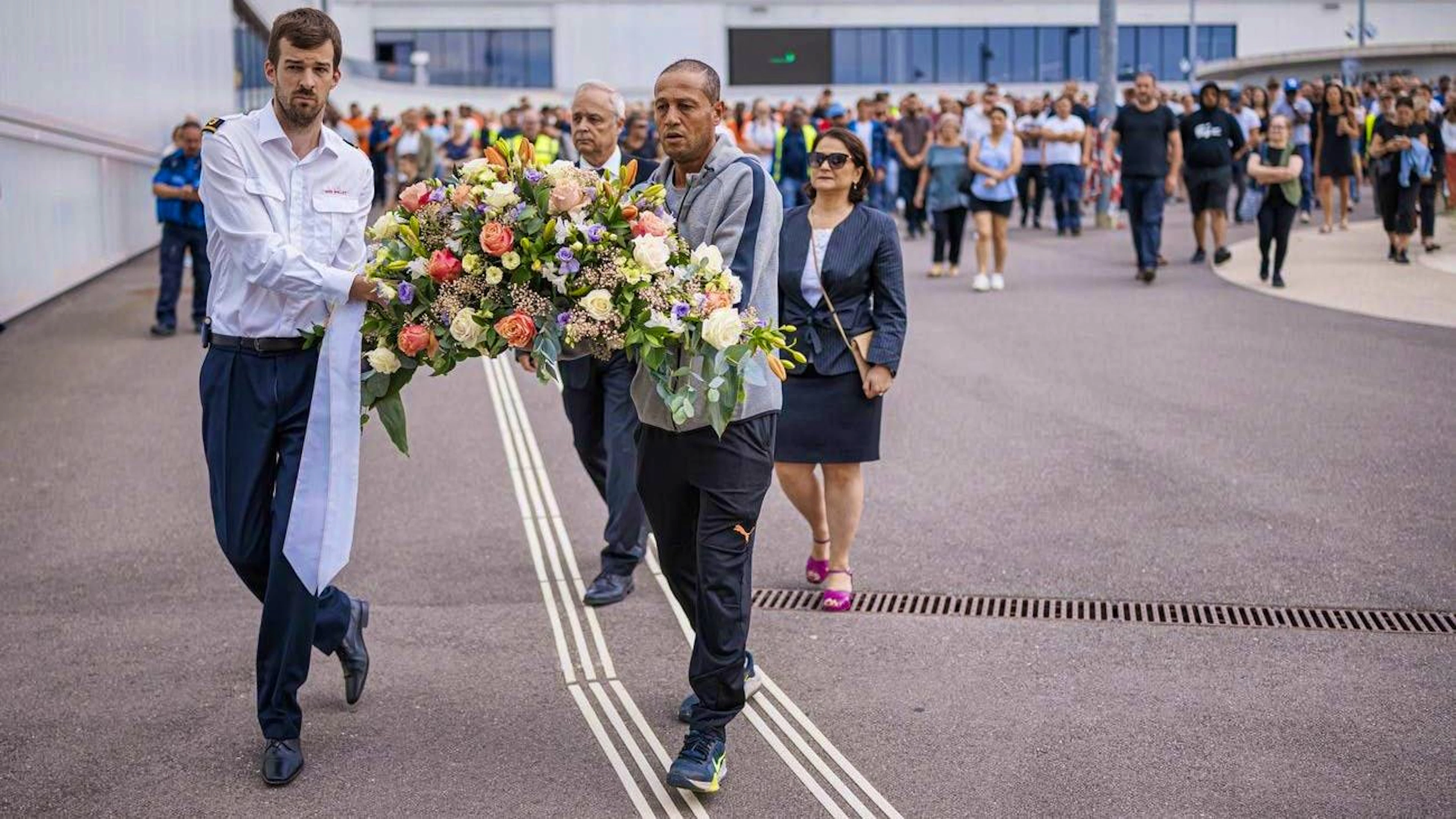 Some people laid flowers and candles.