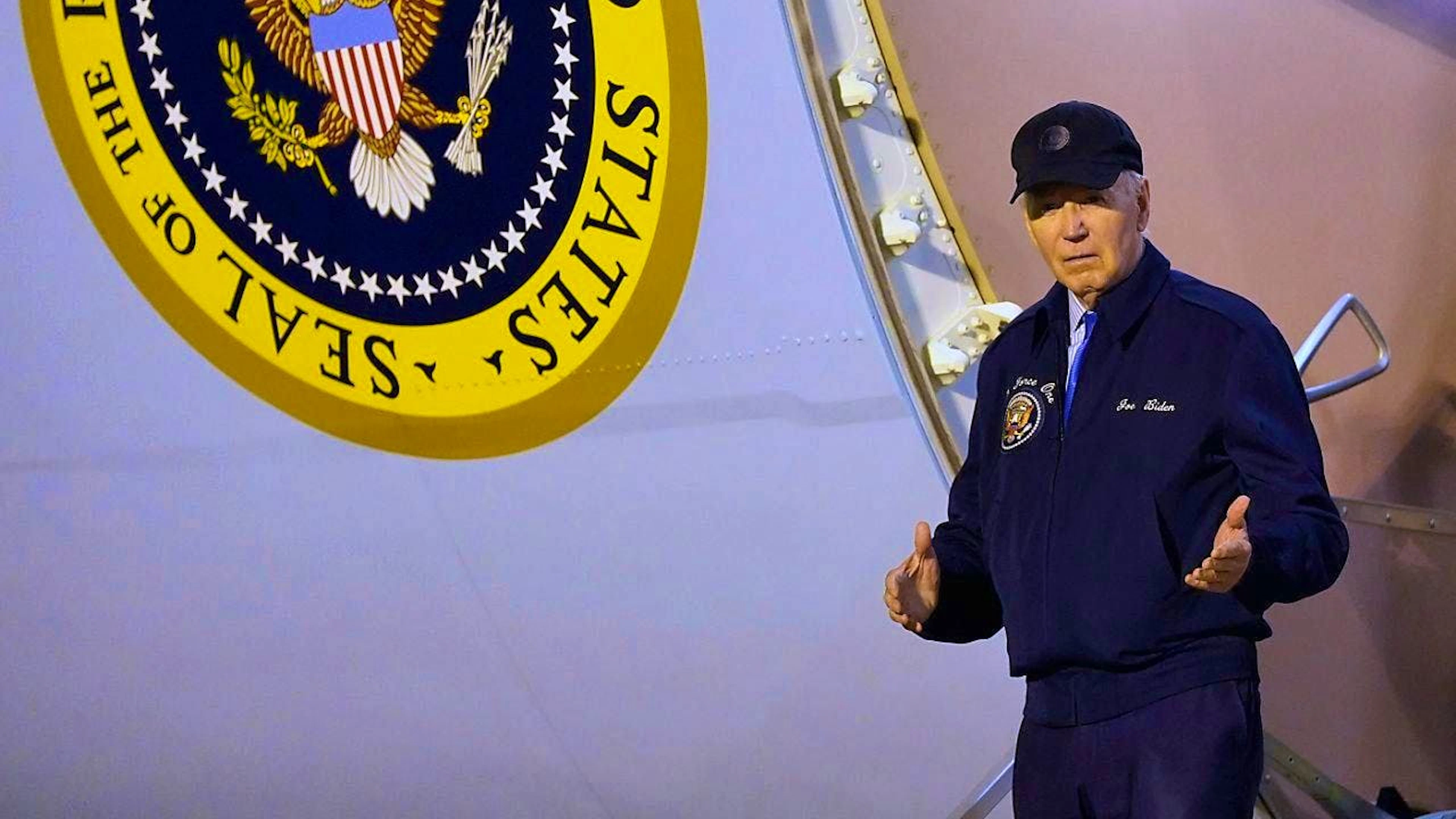 US President Joe Biden walking down the steps of Air Force One at Dover Air Force Base in Delaware. Photo: Susan Walsh/AP/dpa