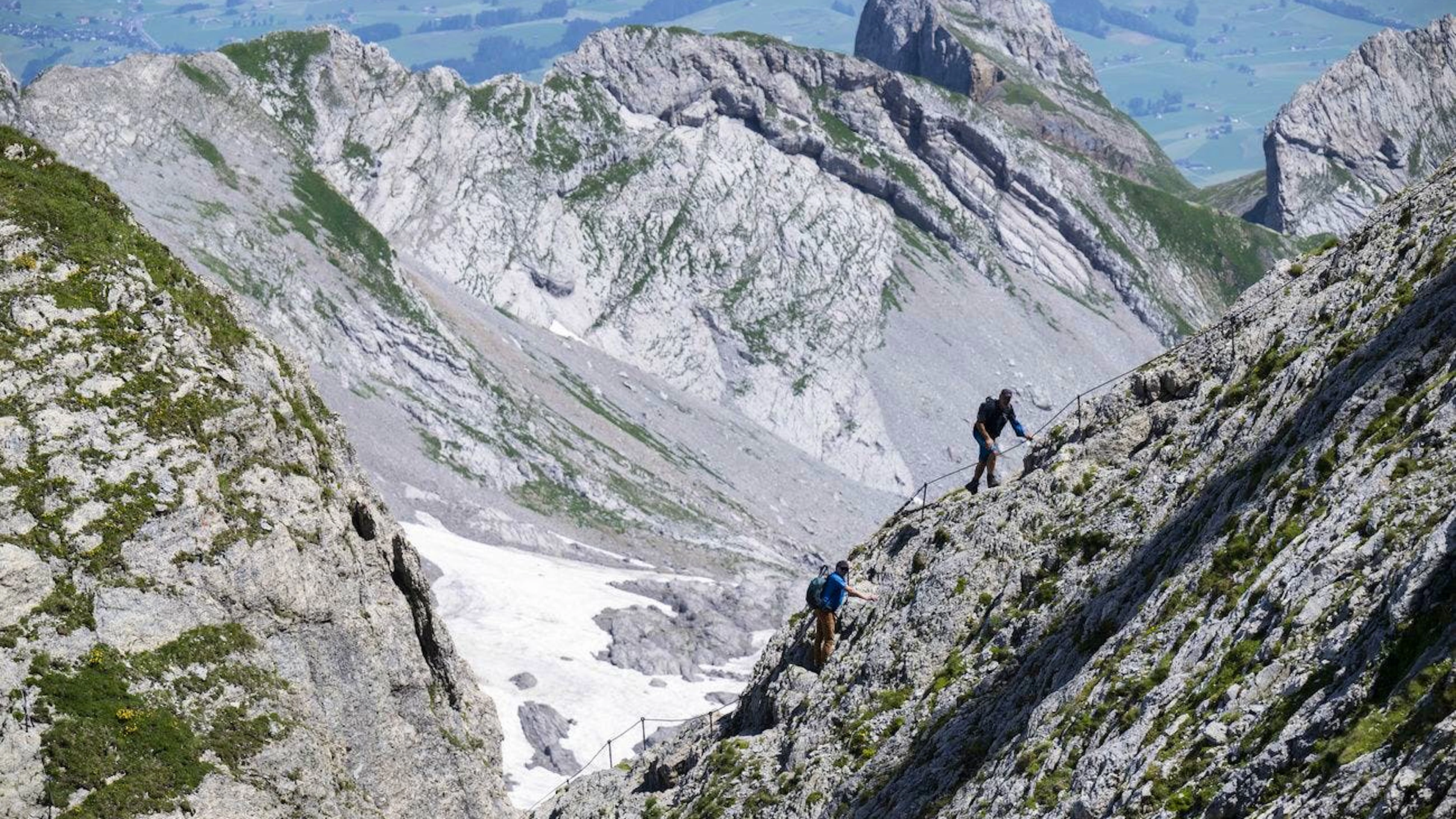 Hikers climb the Säntis via the so-called "Heaven's Ladder."
