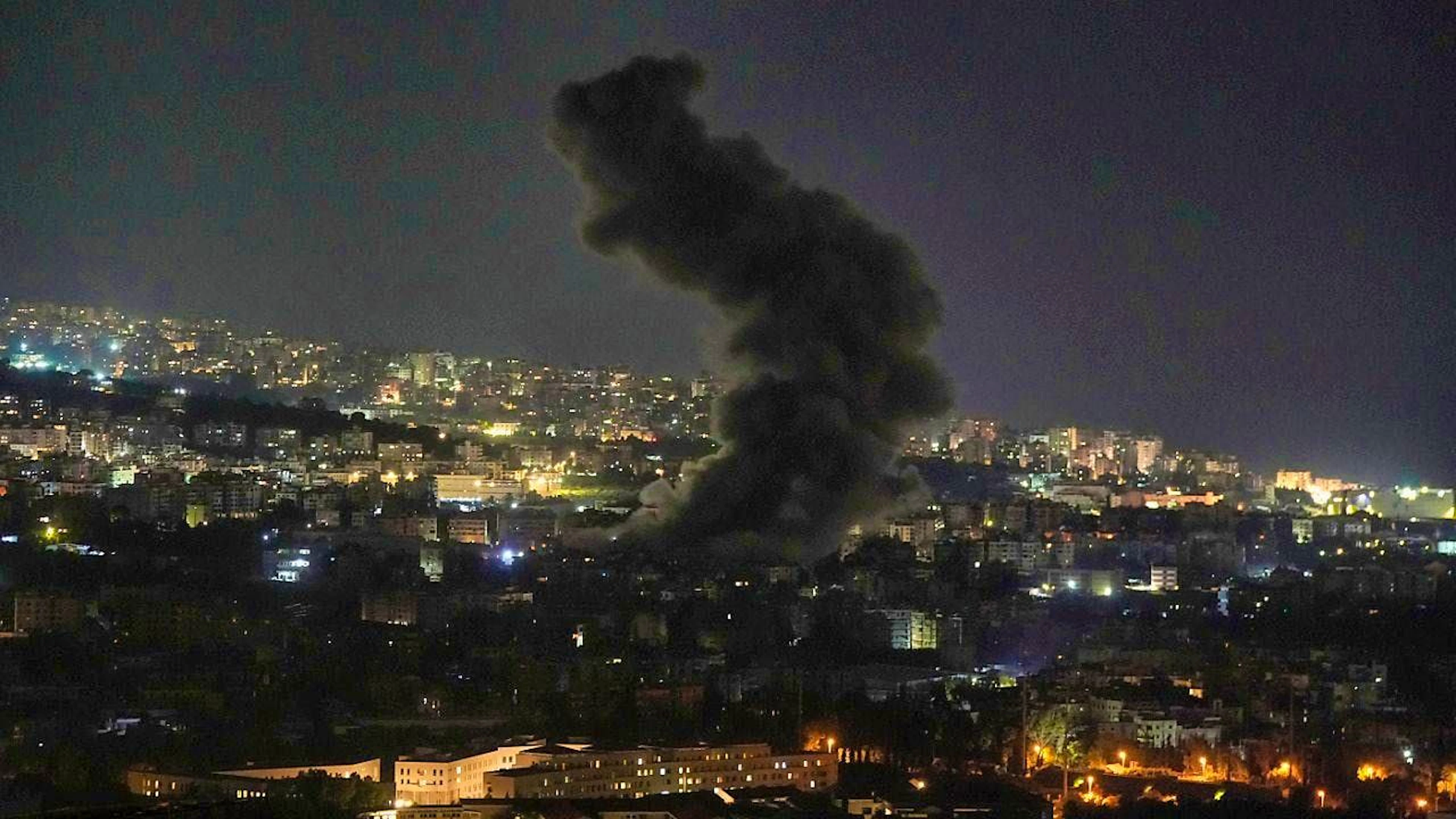 Smoke rises after an Israeli airstrike in Dahieh, a suburb of Beirut. Photo: Bilal Hussein/AP/dpa