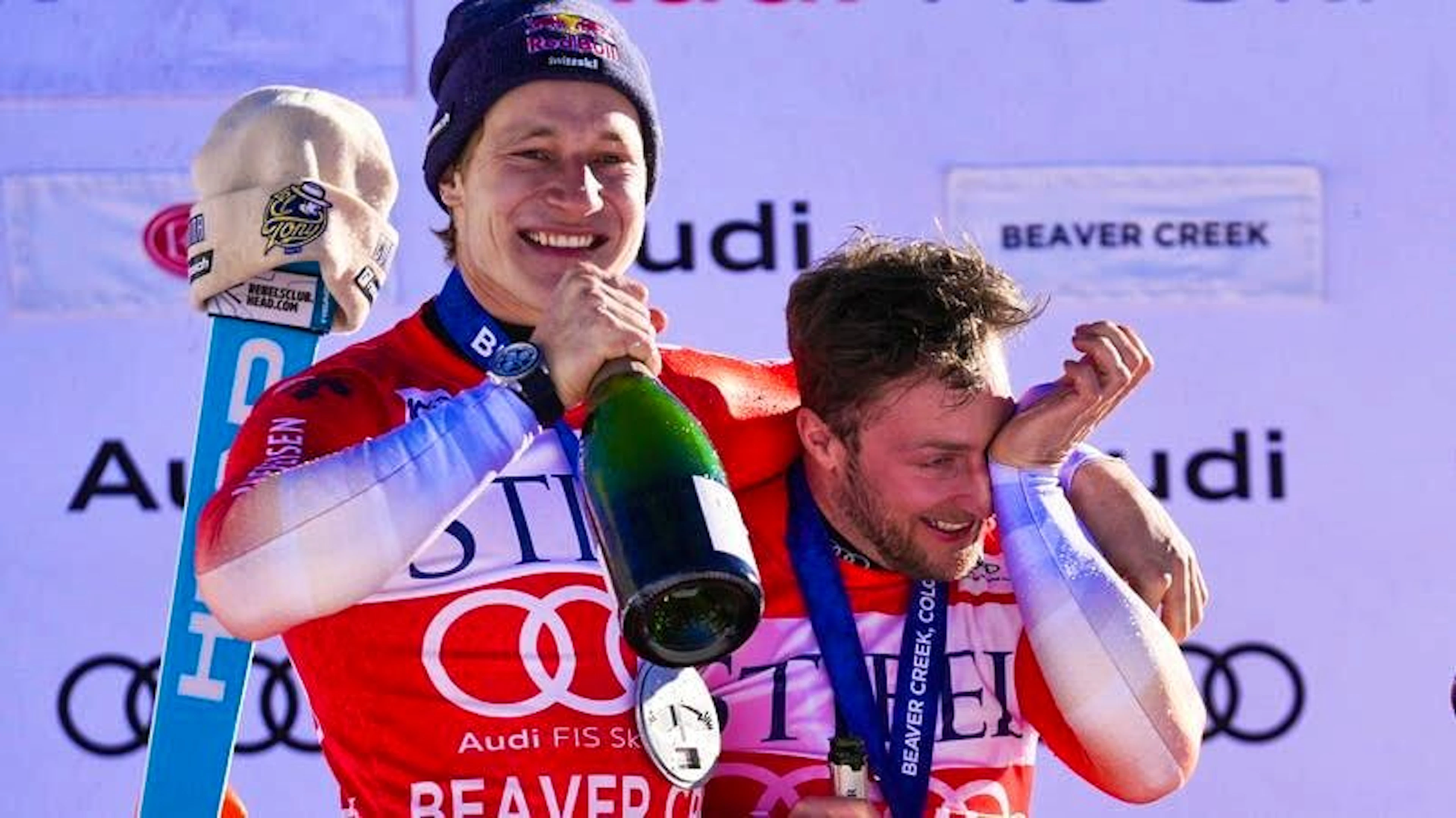 Tears of joy or champagne? Justin Murisier (right) has something in mind.