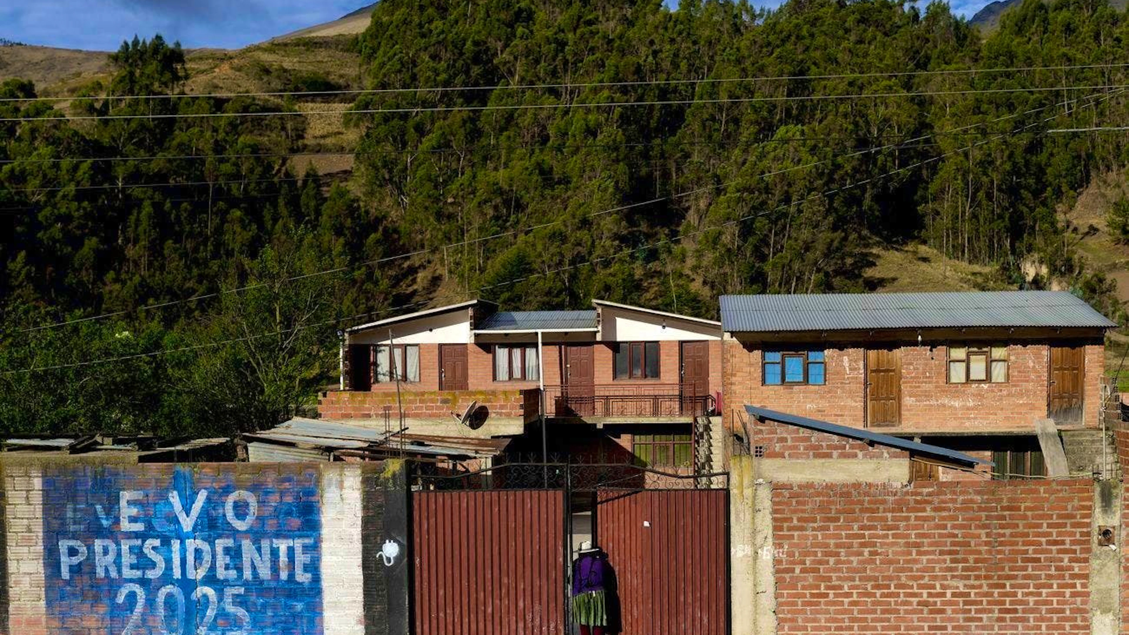 An inscription on a wall in Colomi promotes Evo Morales as president for 2025.
