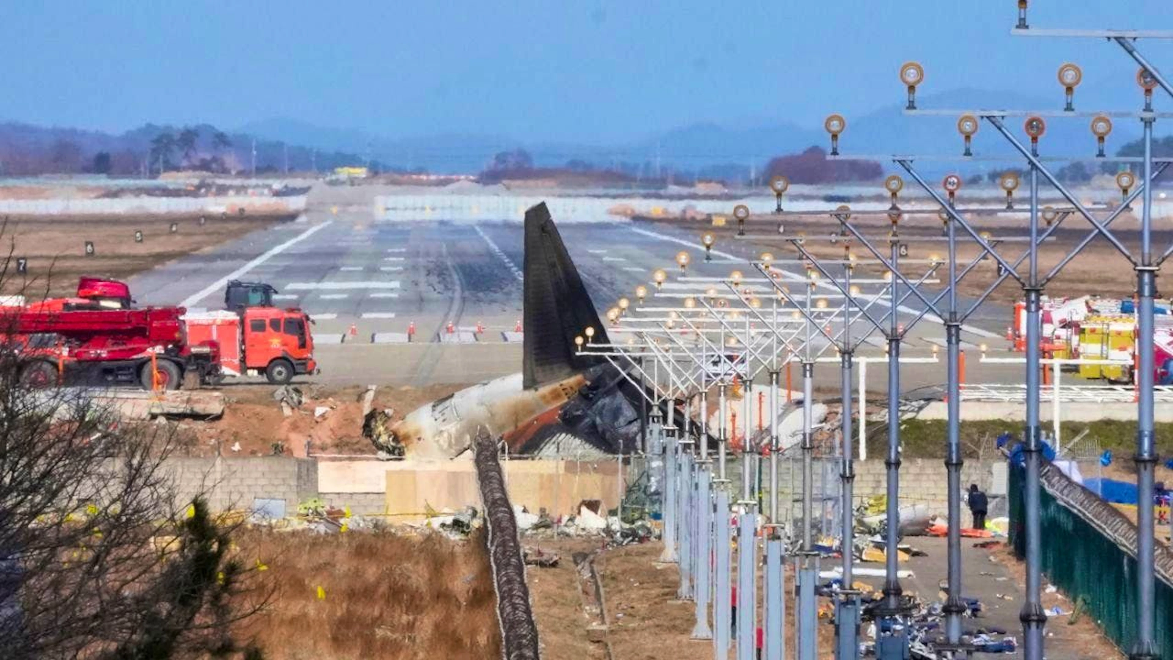 The wreckage of a Boeing 737-800 of the South Korean airline Jeju Air lies at Muan International Airport. Photo: Ahn Young-joon/AP/dpa