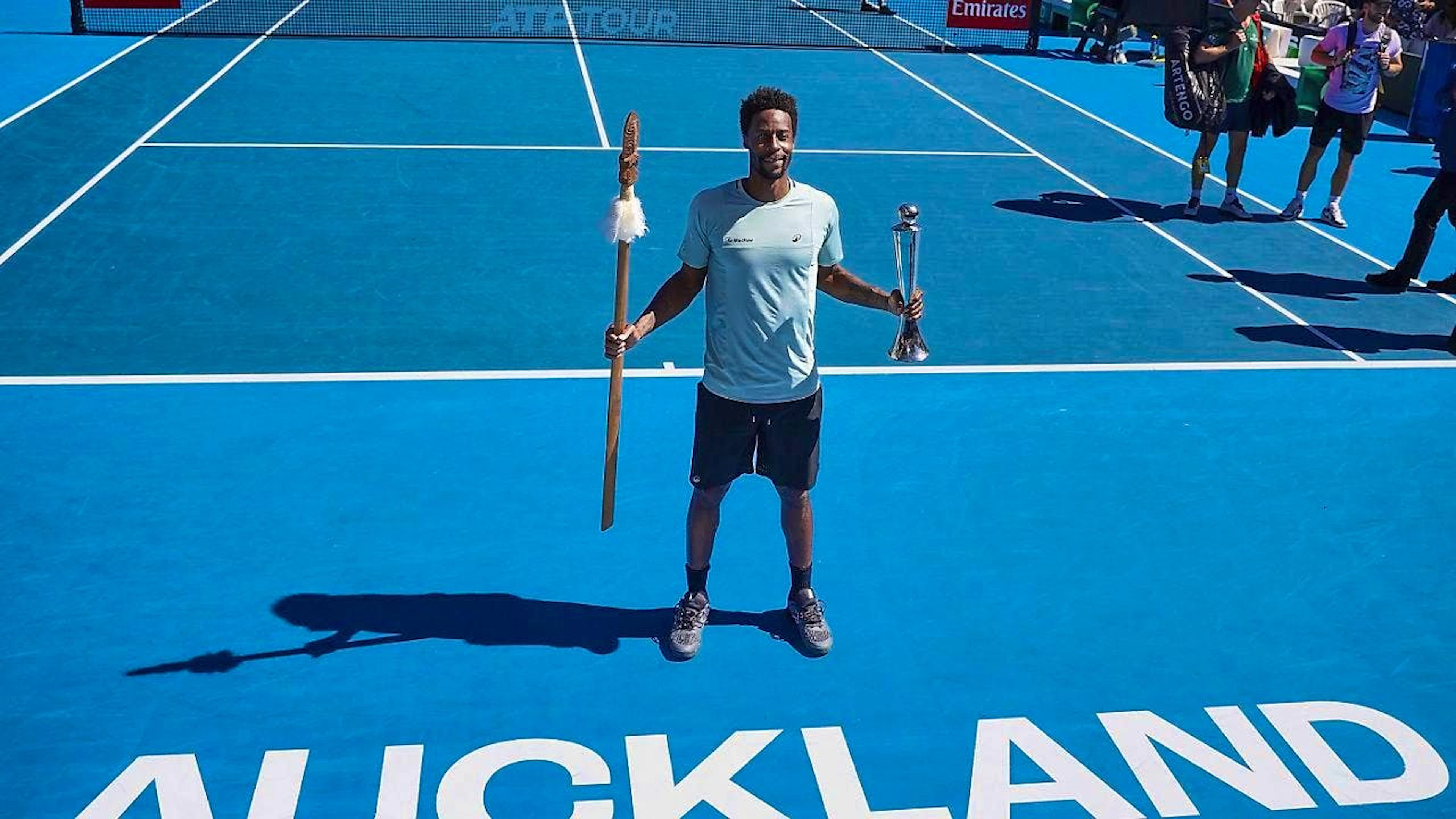 Gaël Monfils with the trophies for winning the tournament in Auckland