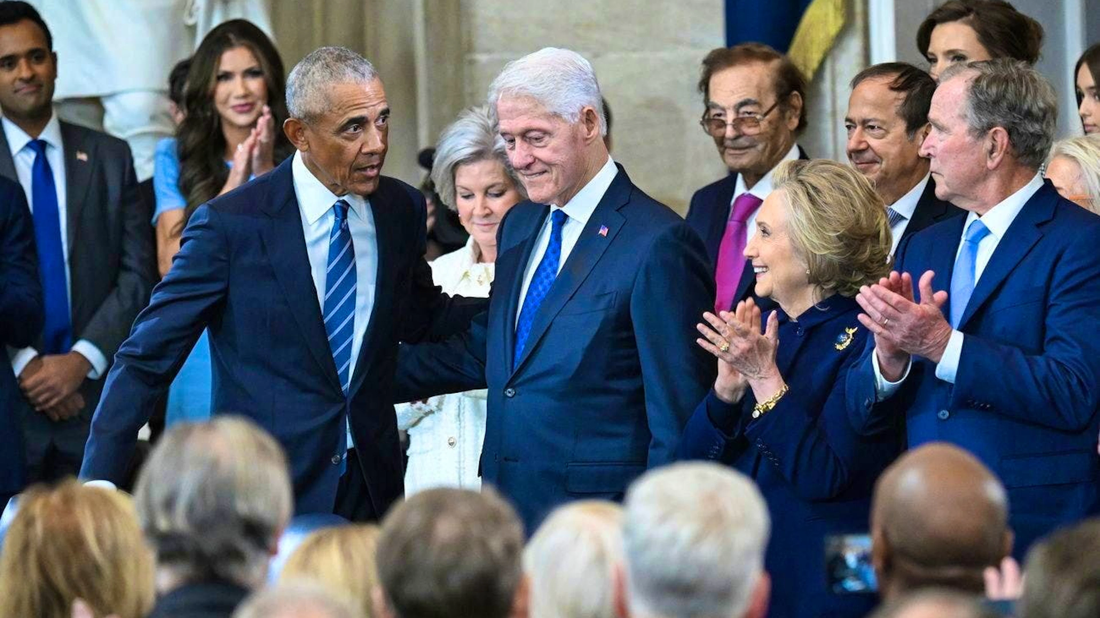 Barack Obama, Bill Clinton, Hillary Clinton and George W. Bush.