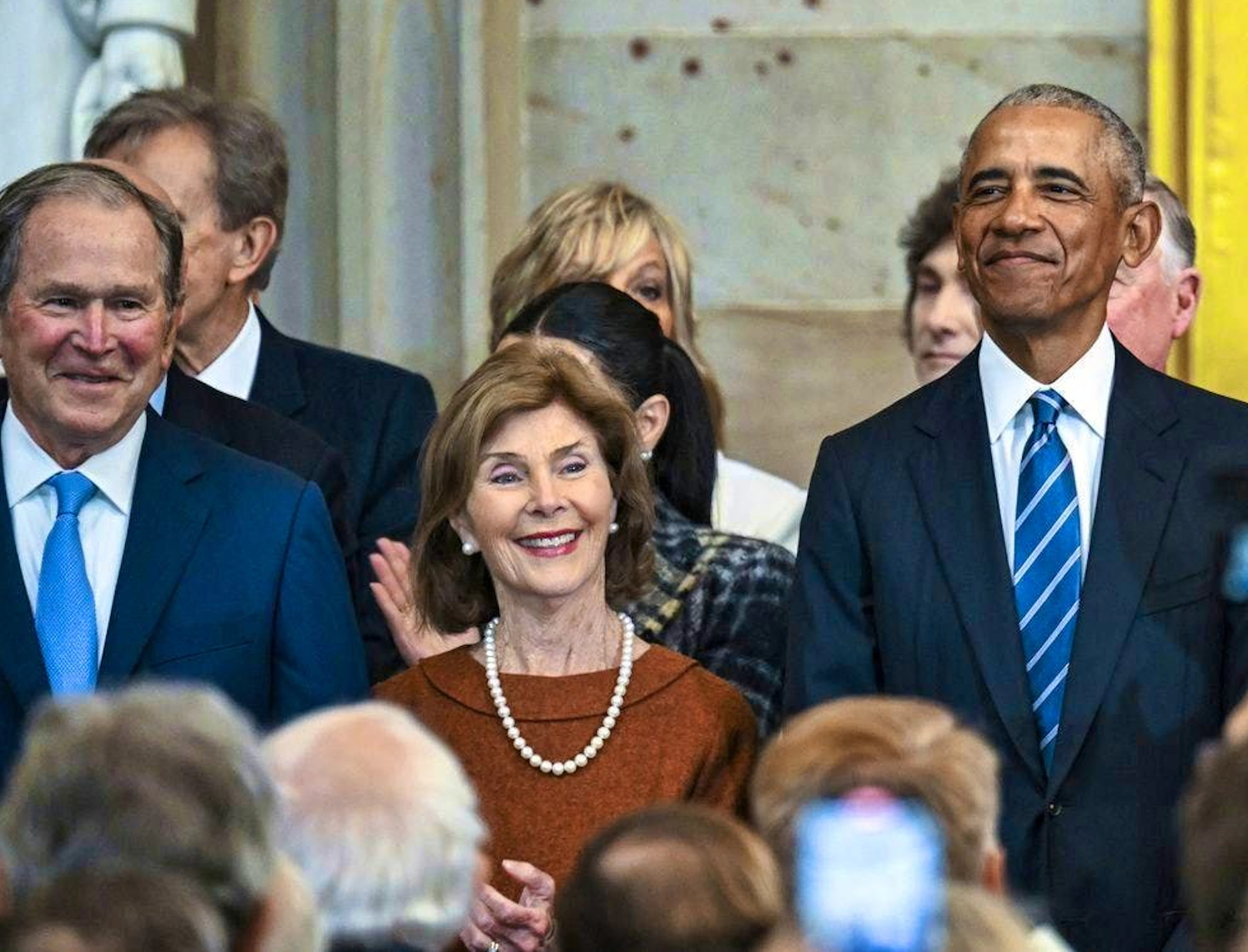 George W. Bush, Laura Bush and Barack Obama.