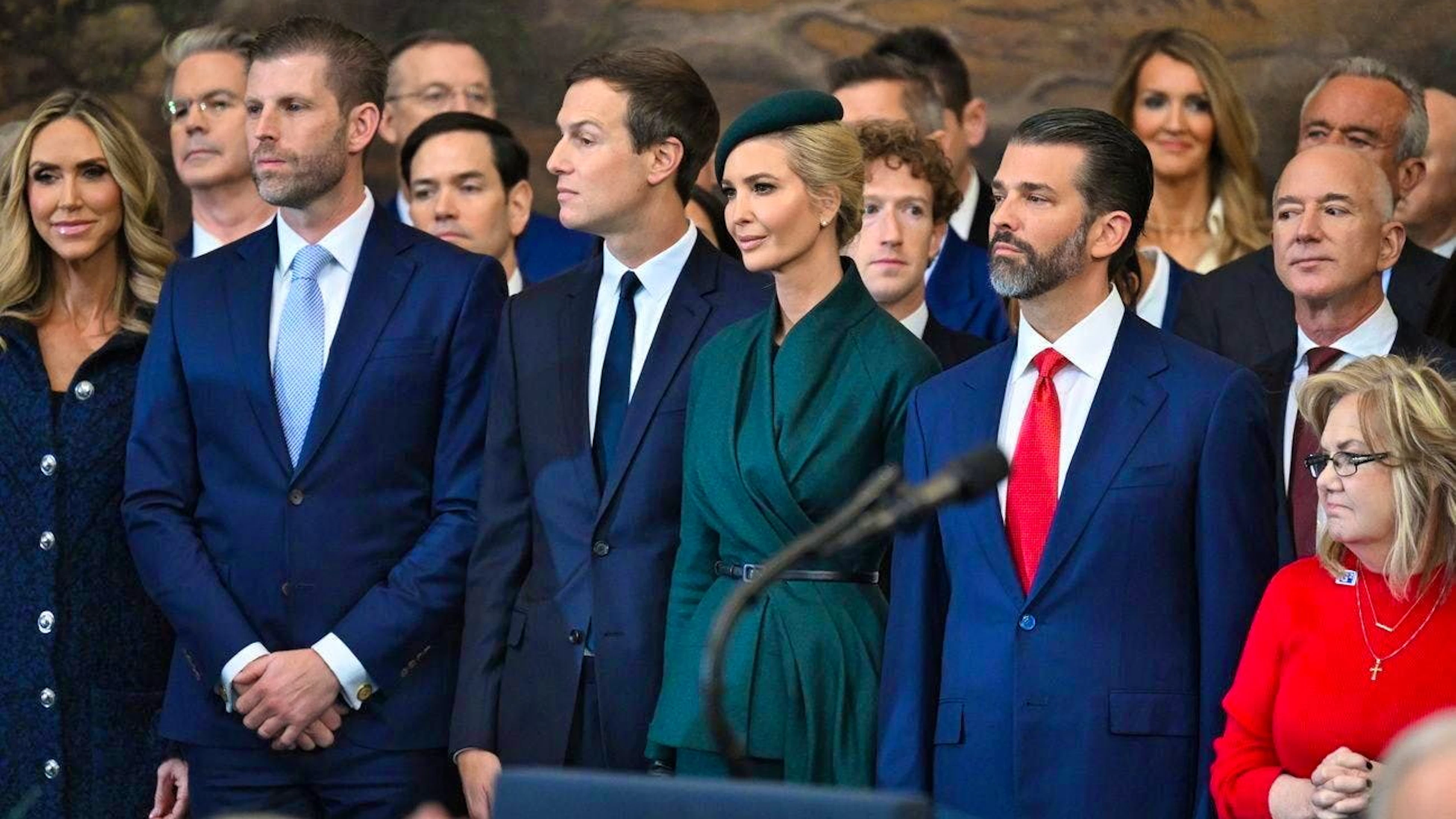 Trump's family during the ceremony. Right behind them are the CEOs of major tech companies - see later pictures.