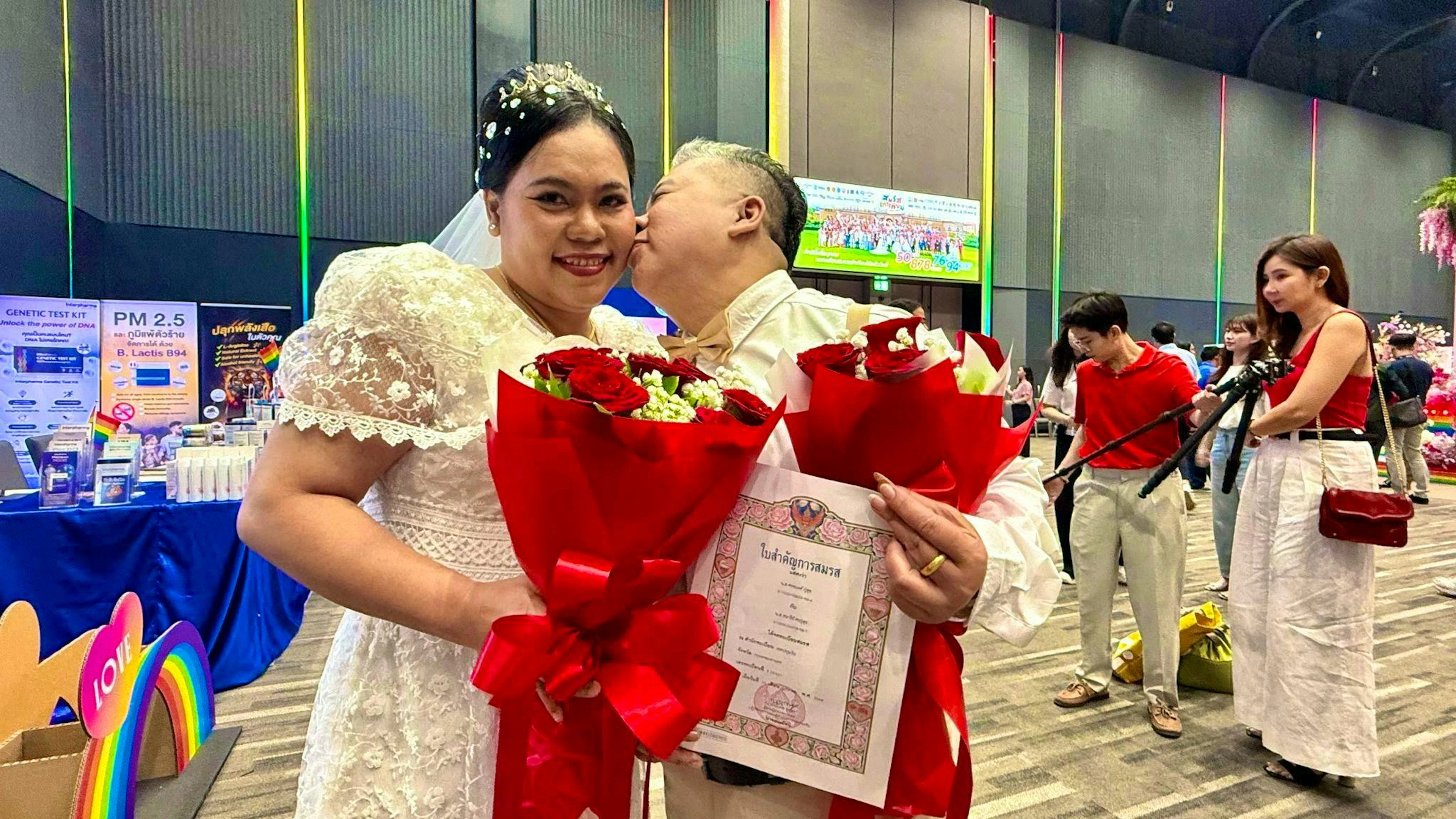 Numerous couples attended a mass wedding at the Siam Paragon shopping center in Bangkok.