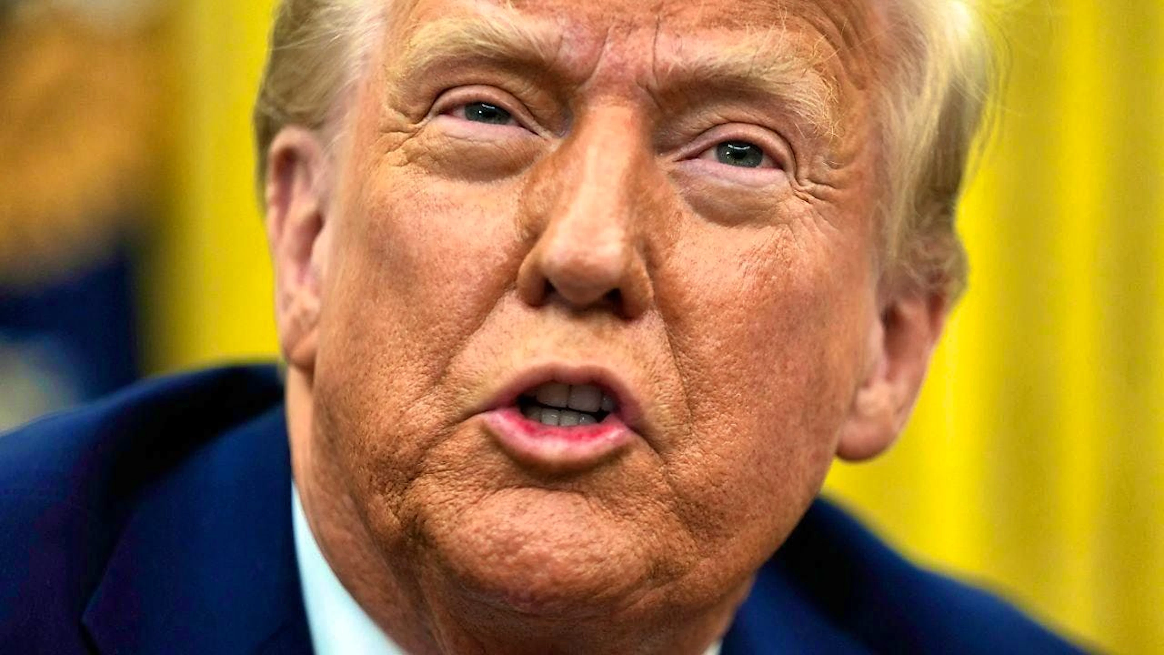 US President Donald Trump speaks in the Oval Office of the White House as he signs an executive order granting federal recognition to the Limbee Tribe of North Carolina. Photo: Ben Curtis/AP/dpa