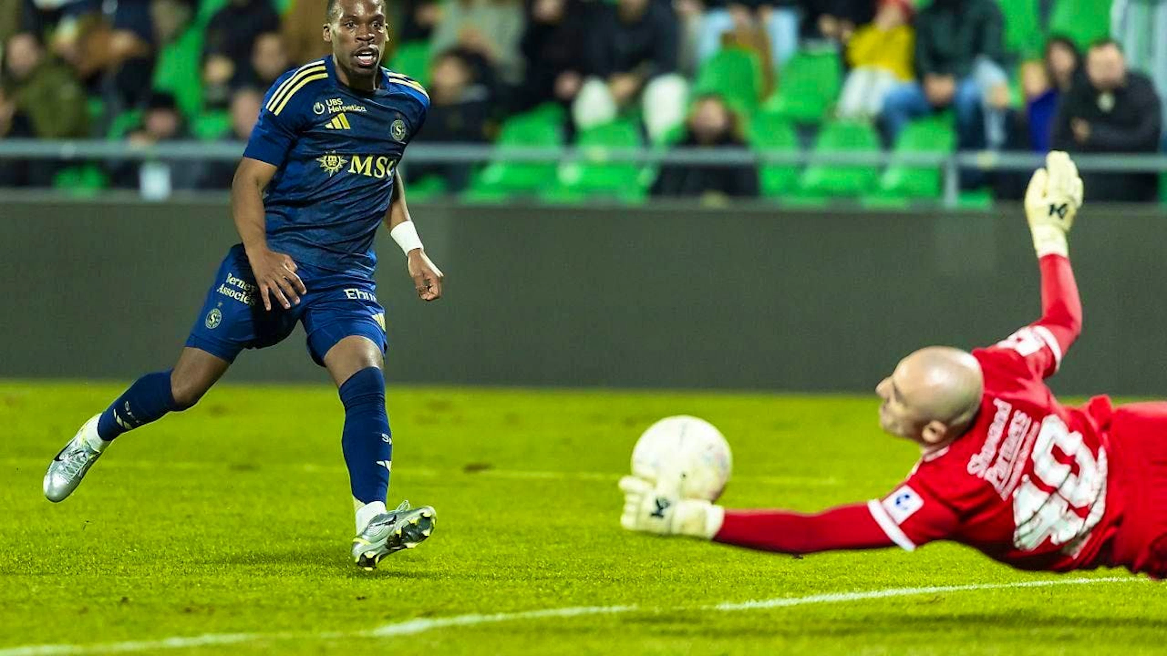 Dereck Kutesa's shot fails to beat Yverdon goalie Paul Bernardoni