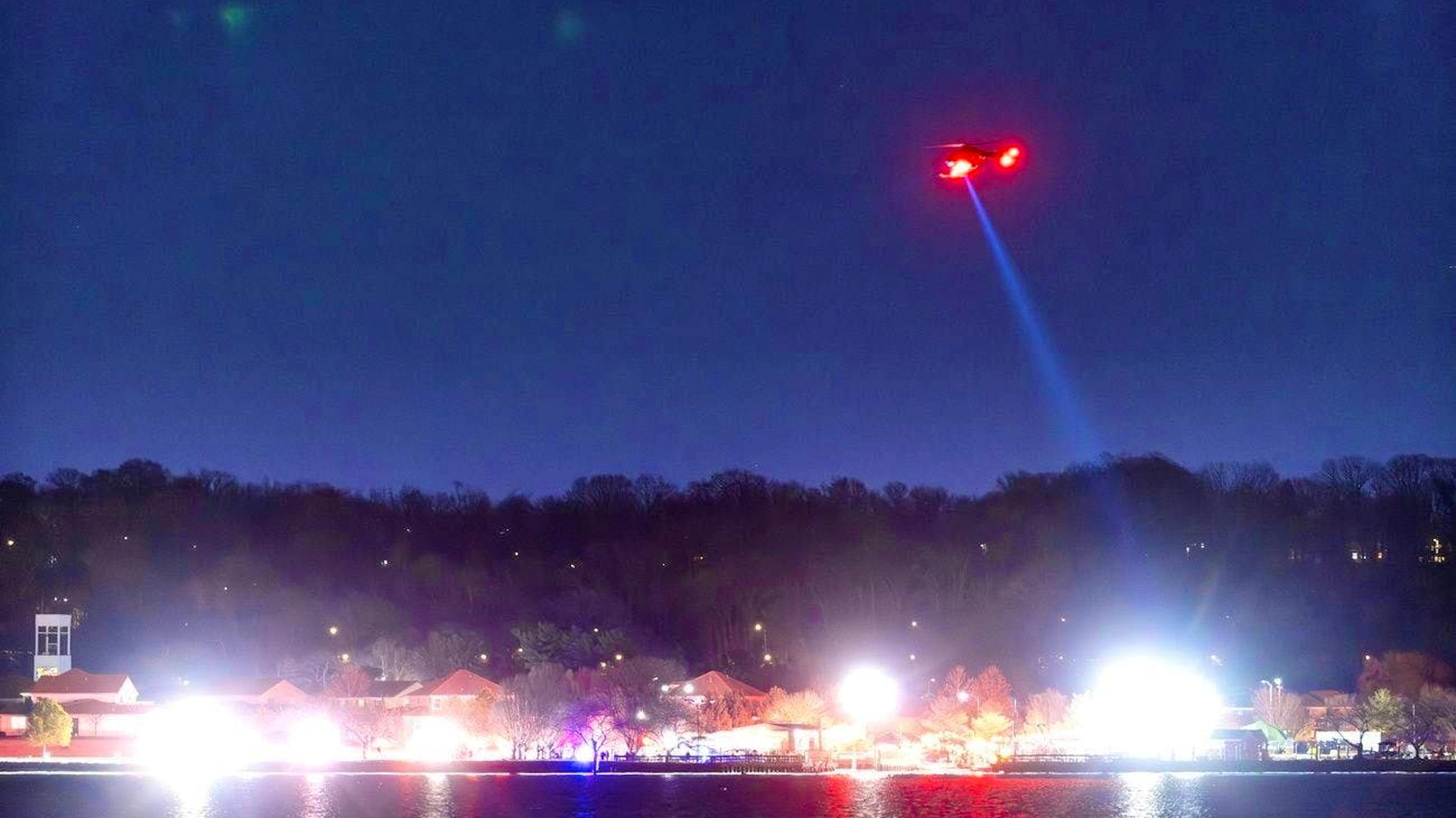 Rescue teams search the Potomac River in Washington D.C. for victims of the flight accident.