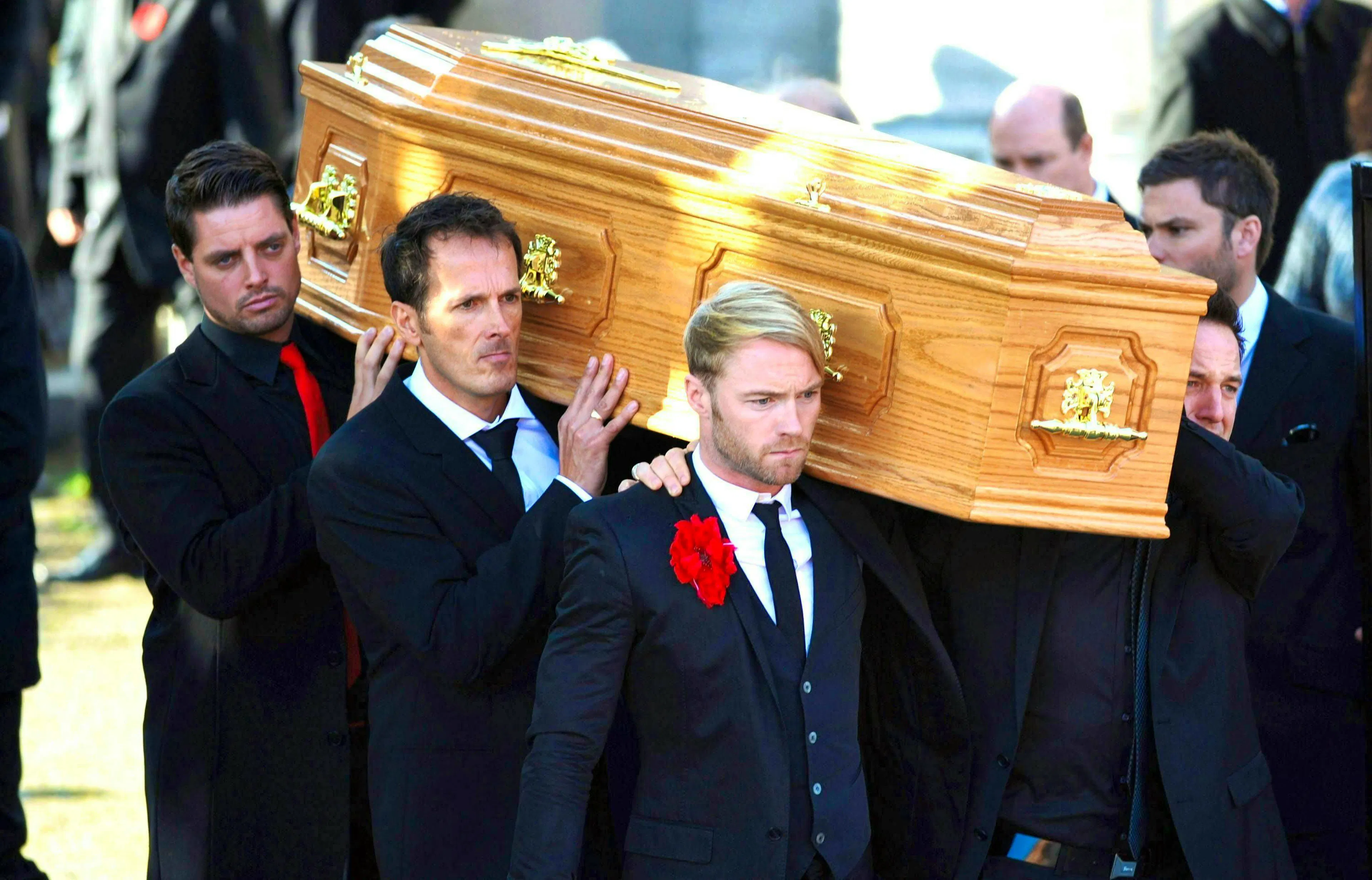 Boyzone stars slept next to their late friend's coffin