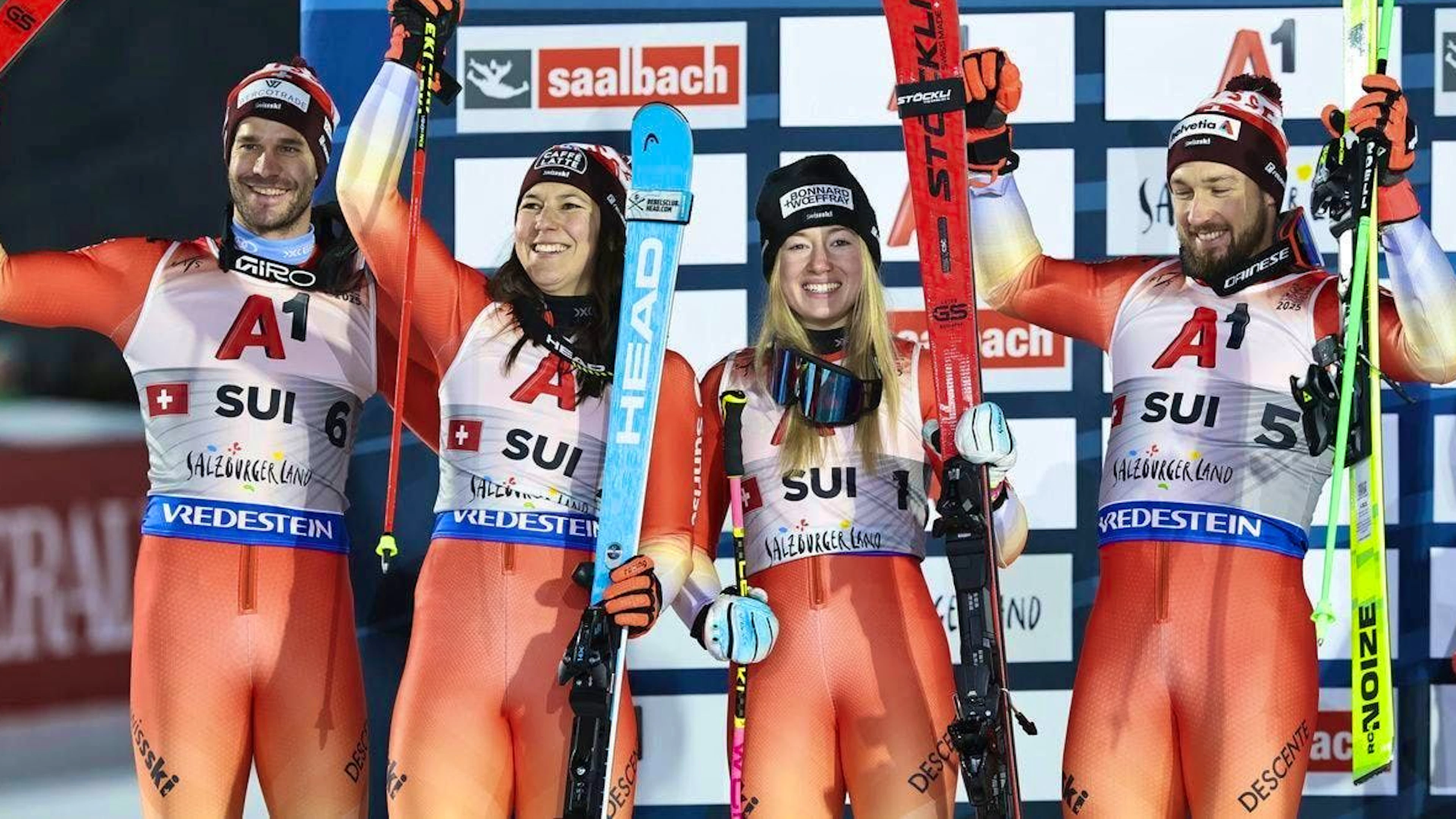Delphine Darbellay (2nd from right) celebrates silver with Switzerland in the team competition at the World Ski Championships.
