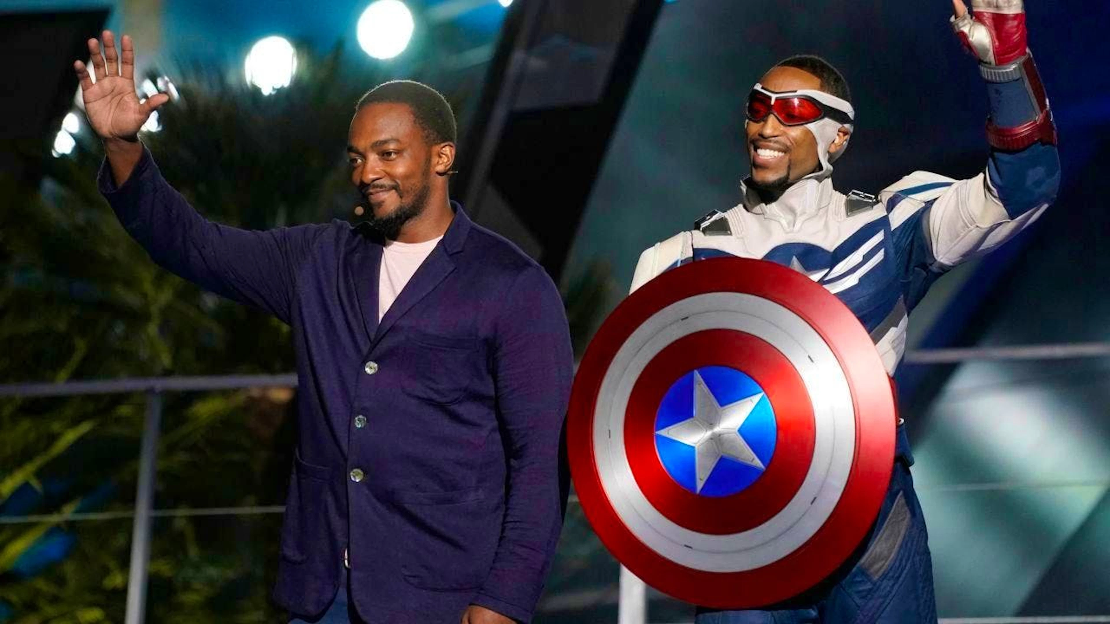 ARCHIVE - US actor Anthony Mackie (l) and his character Captain America wave during the inauguration ceremony of the "Avengers Campus" at Disney's California Adventure Park.