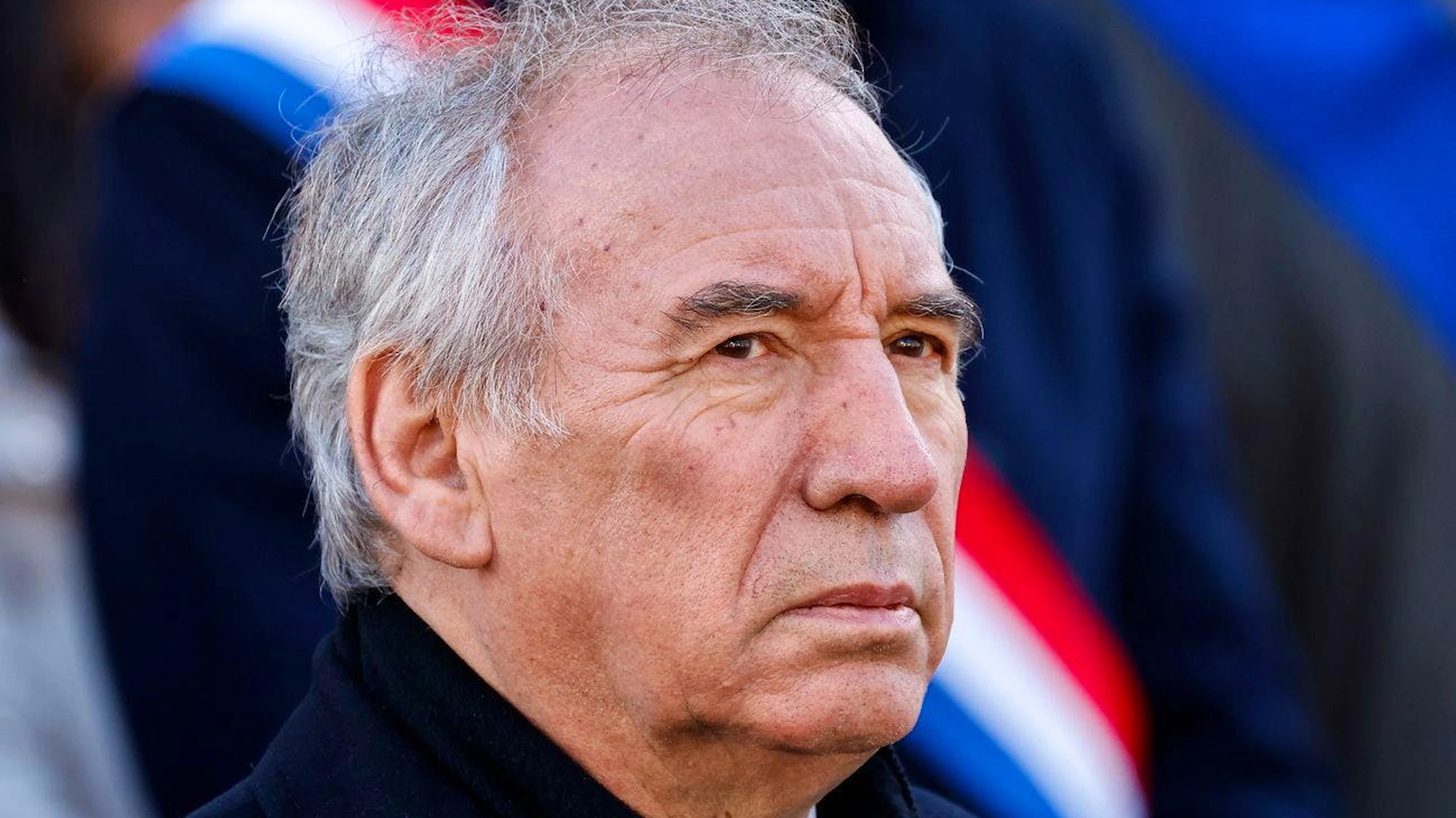 epa11811072 France's Prime Minister Francois Bayrou looks on as he attends a ceremony on the Richard Lenoir boulevard as part of the commemorations marking 10 years since an Islamist attack on the Charlie Hebdo satirical newspaper and the Hypercacher Jewish supermarket, in Paris, France, 07 January 2025. Twelve people died in the attacks, including eight editorial staff, while a separate but linked hostage-taking at a Jewish supermarket in eastern Paris by a third gunman on 09 January 2015 claimed another four lives. EPA/LUDOVIC MARIN / POOL MAXPPP OUT