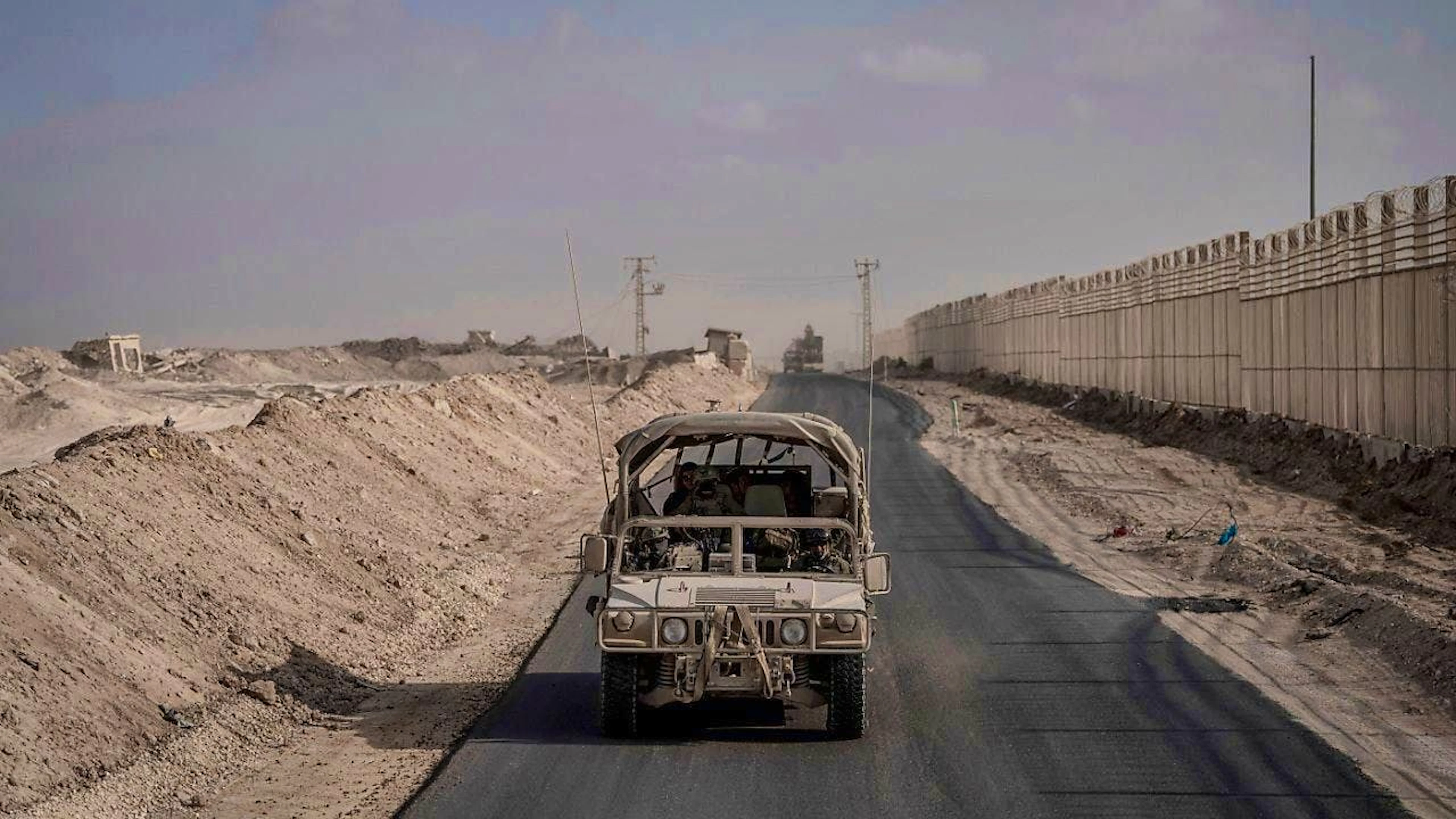 ARCHIVE - A photo taken during an Israel Defense Forces (IDF) operation and reviewed by the IDF's censorship board before publication shows an Israeli army vehicle driving in the Philadelphi Corridor. Photo: Ilia Yefimovich/dpa
