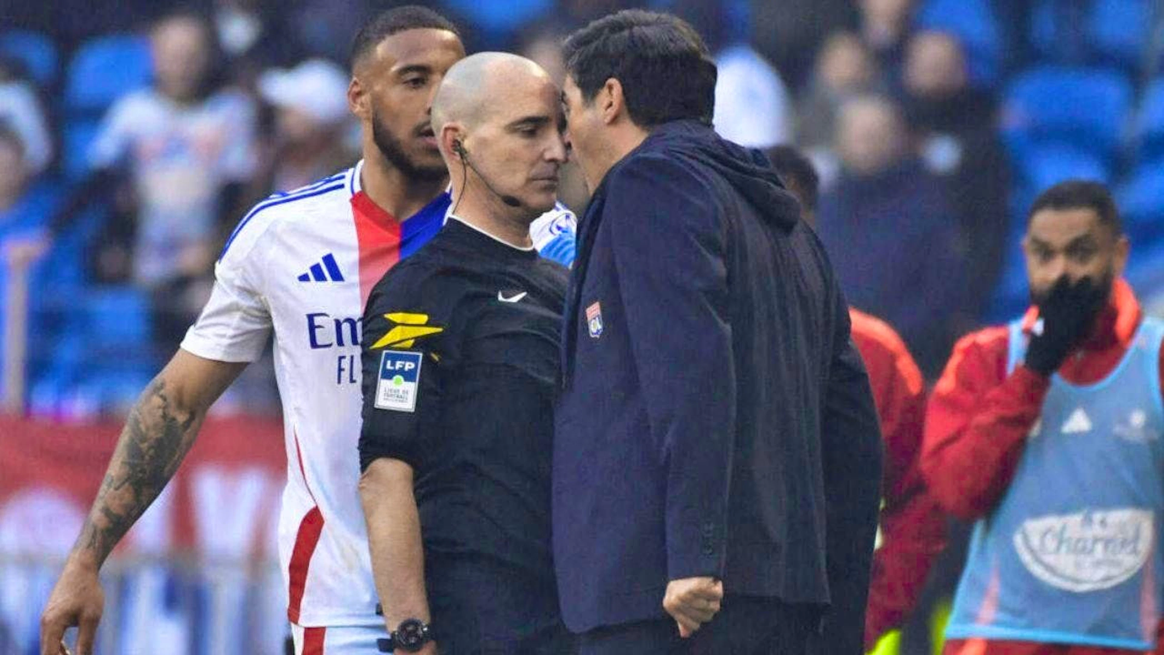 Lyon coach Paulo Fonseca attacks referee Benoît Millot.