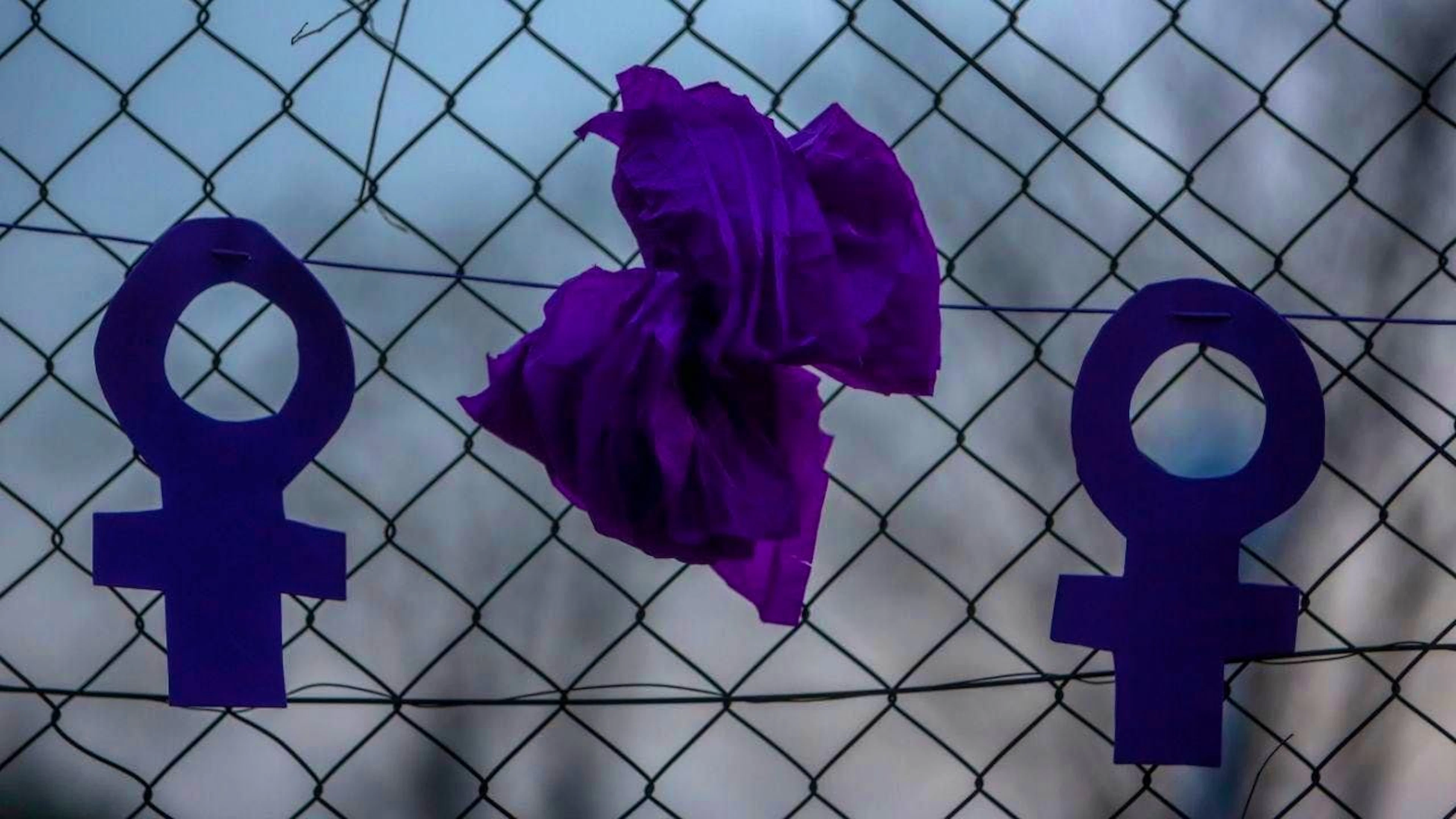 ARCHIVE - Two feminist symbols hang on a fence during a rally for equal rights ahead of Women's Day. Photo: Ricardo Rubio/EUROPA PRESS/dpa