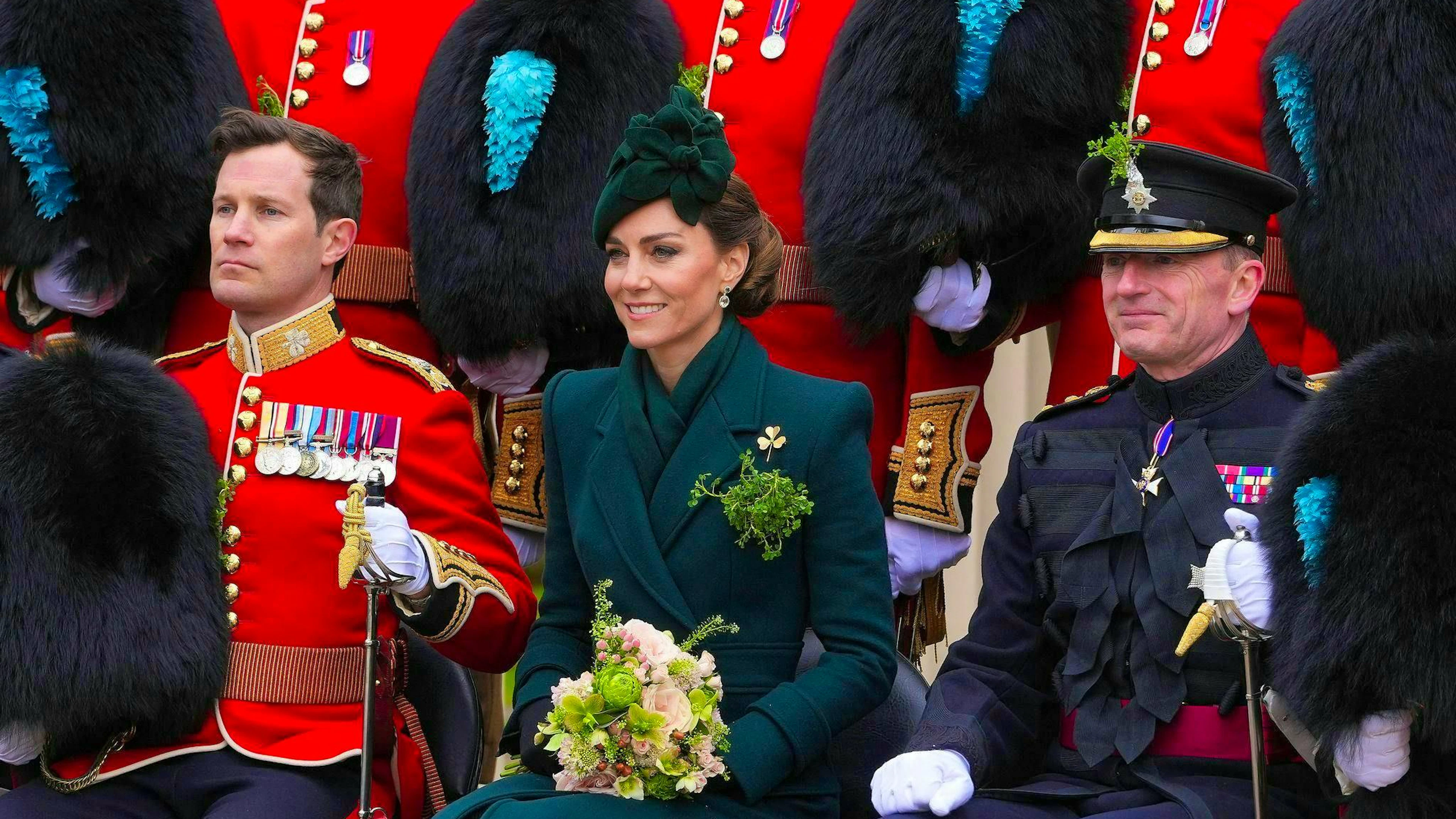 Kate wore a green outfit with a gold shamrock pin to match the occasion.