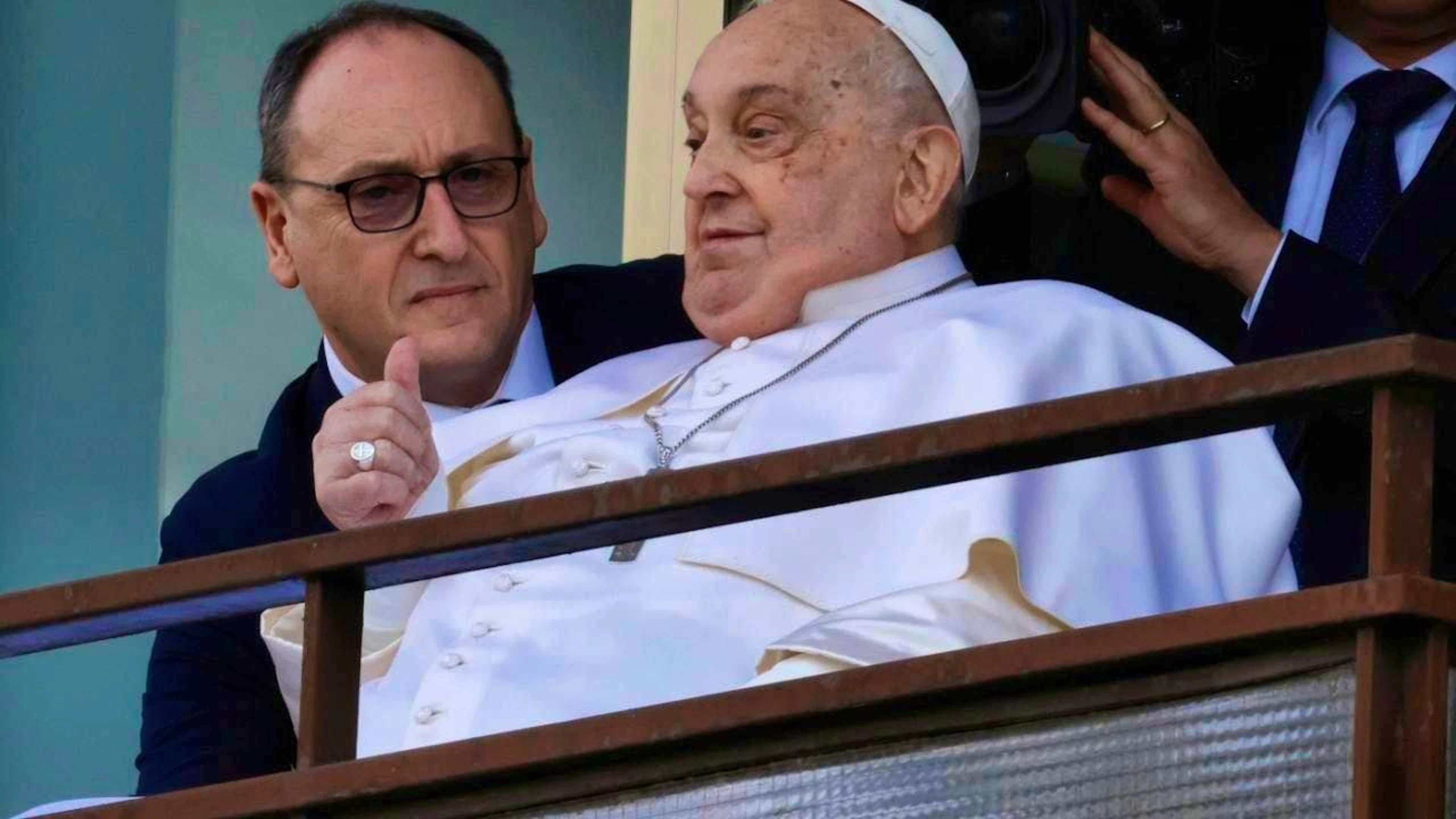 Pope Francis gives a thumbs-up at a window of the Agostino Gemelli Polyclinic in Rome, where he has been receiving treatment for bronchitis and bilateral pneumonia since February 14. He is due to leave the clinic later and return to his residence in the Vatican. Photo: Riccardo De Luca/AP/dpa