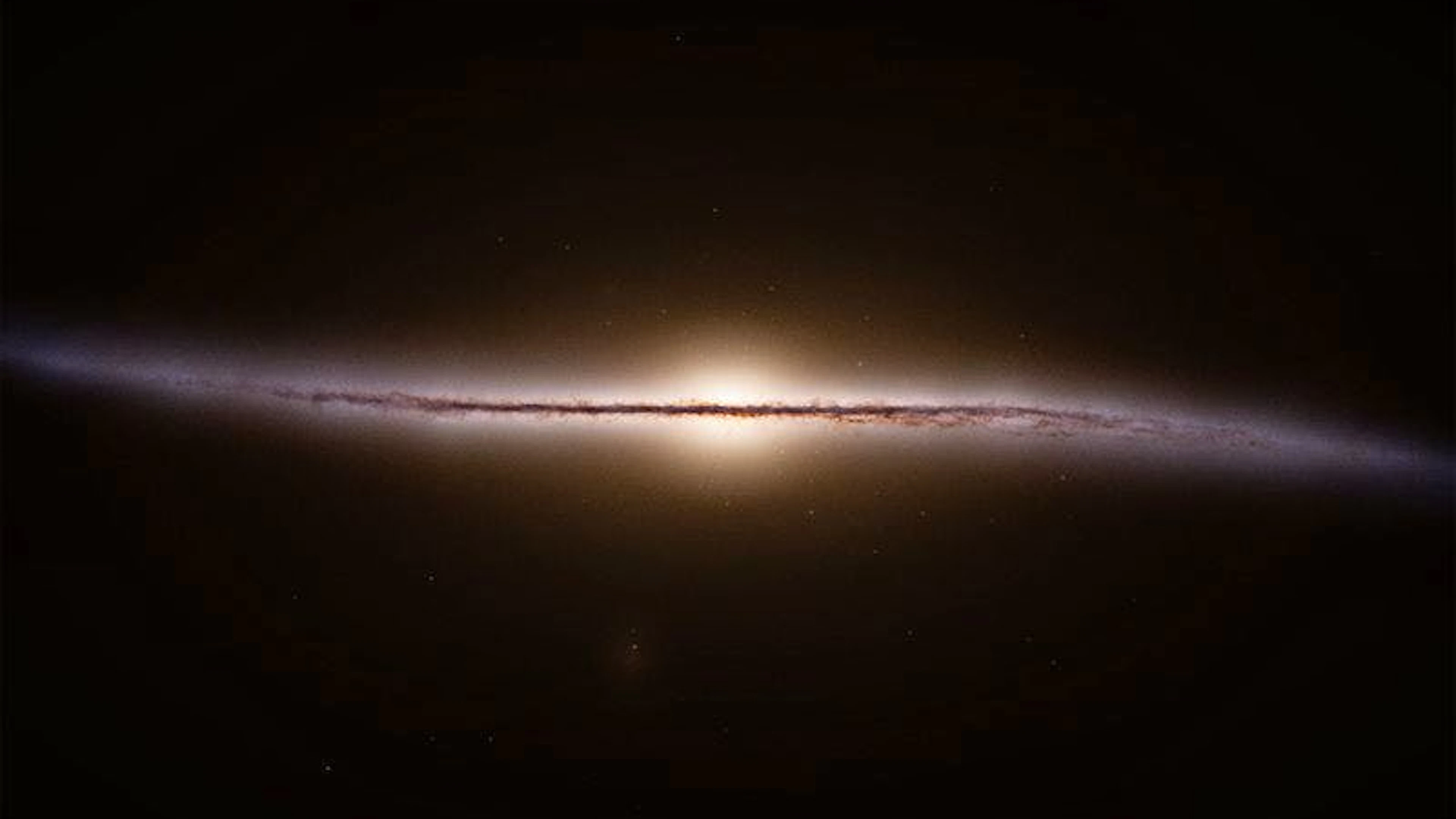 So könnte die Milchstrasse von der Seite betrachtet vor einem pechschwarzen Hintergrund aussehen. Die neue künstlerische Darstellung beruht auf Daten des Weltraumteleskops Gaia.