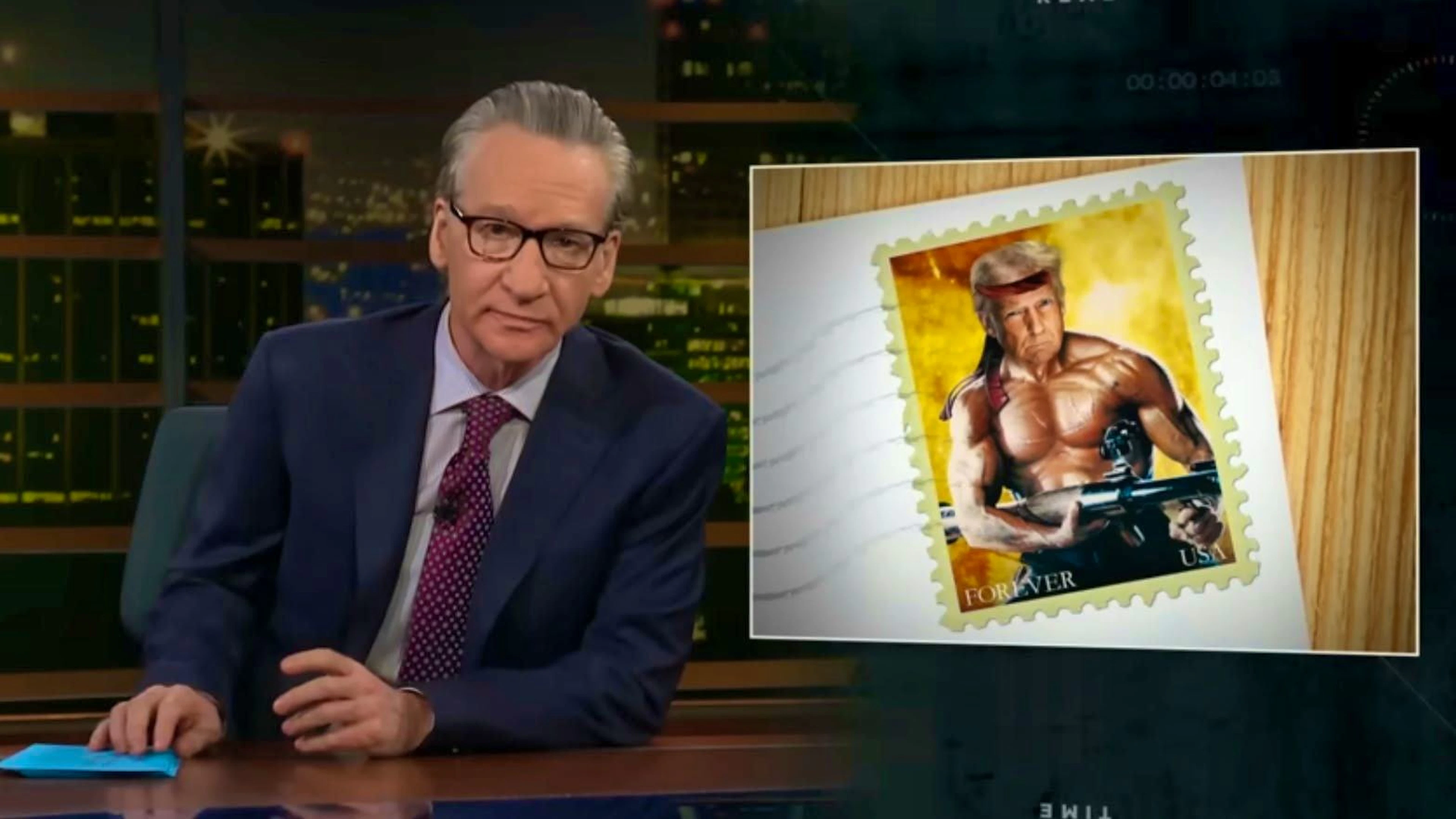 Maher with (still) imaginary Trump stamp