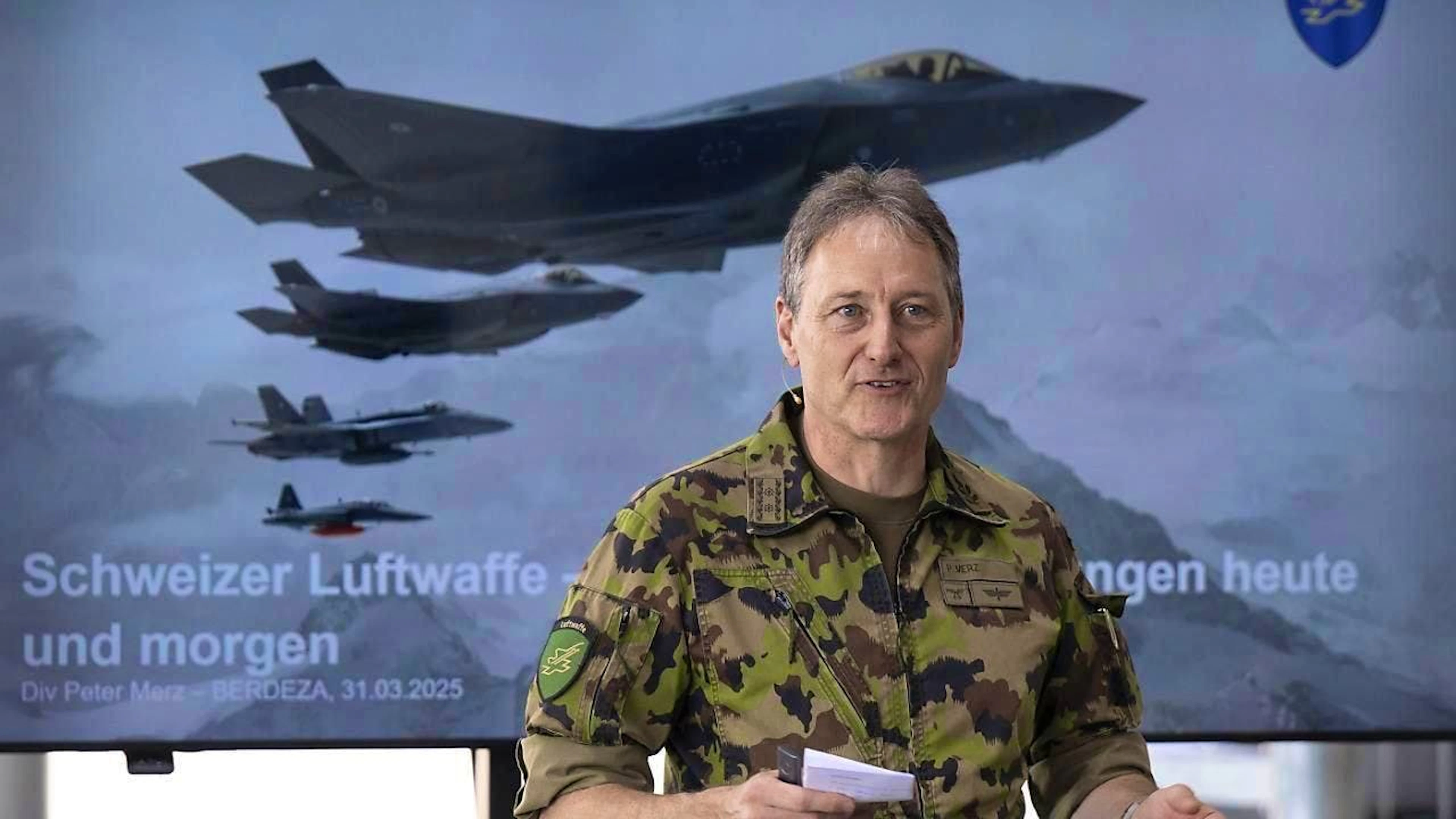The Swiss Air Force wants to decentralize in order to reduce the risk of attack. Divisional Commander of the Swiss Air Force Peter Merz talks about the BERDEZA exercise at Bern-Belp Airport on Monday.