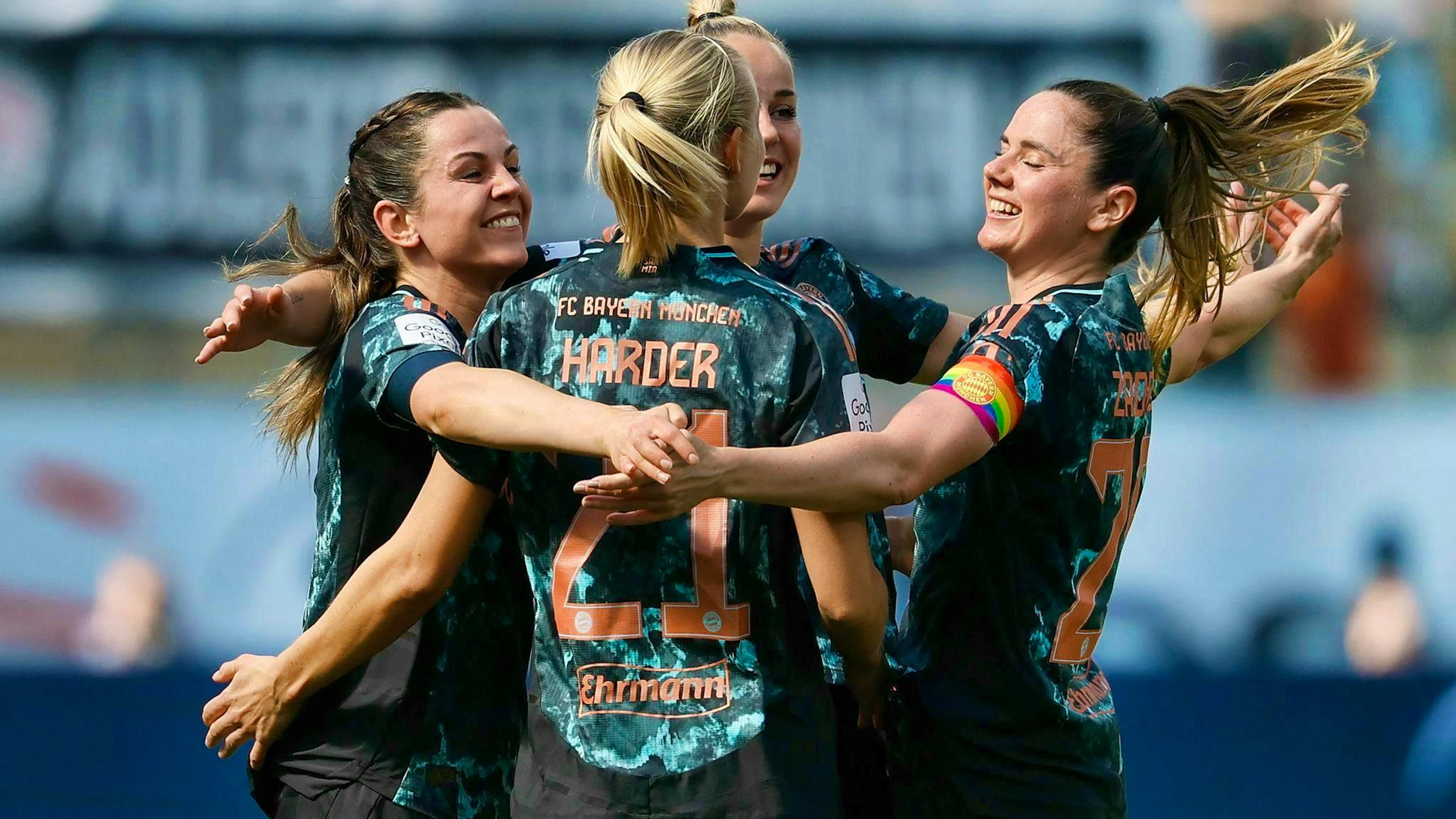 Pernille Harder (center) celebrates for the Bayern women