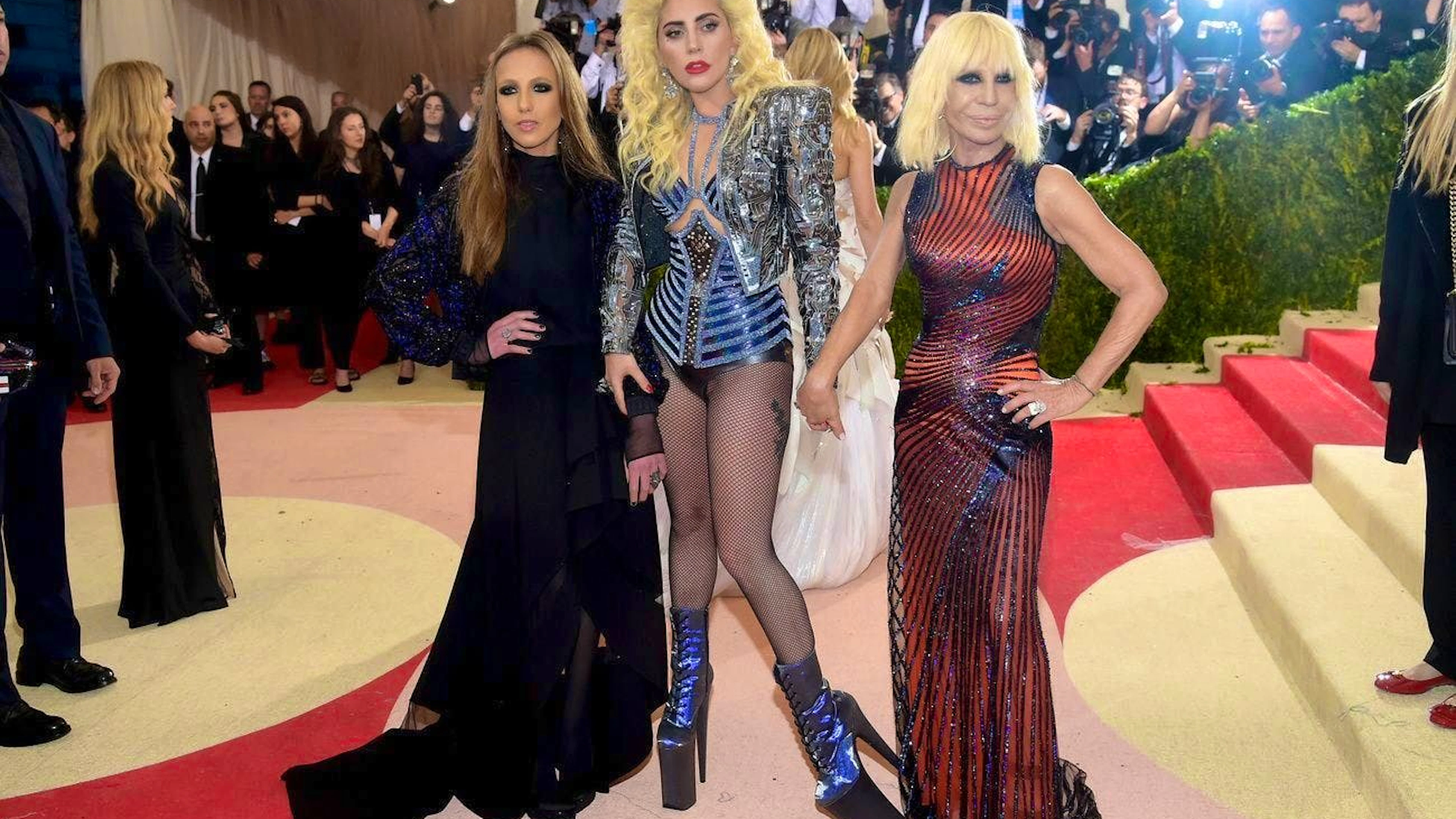 Allegra Versace (left) with Lady Gaga and her mother Donatella Versace at the 2016 Metropolitan Museum of Art benefit gala in New York.