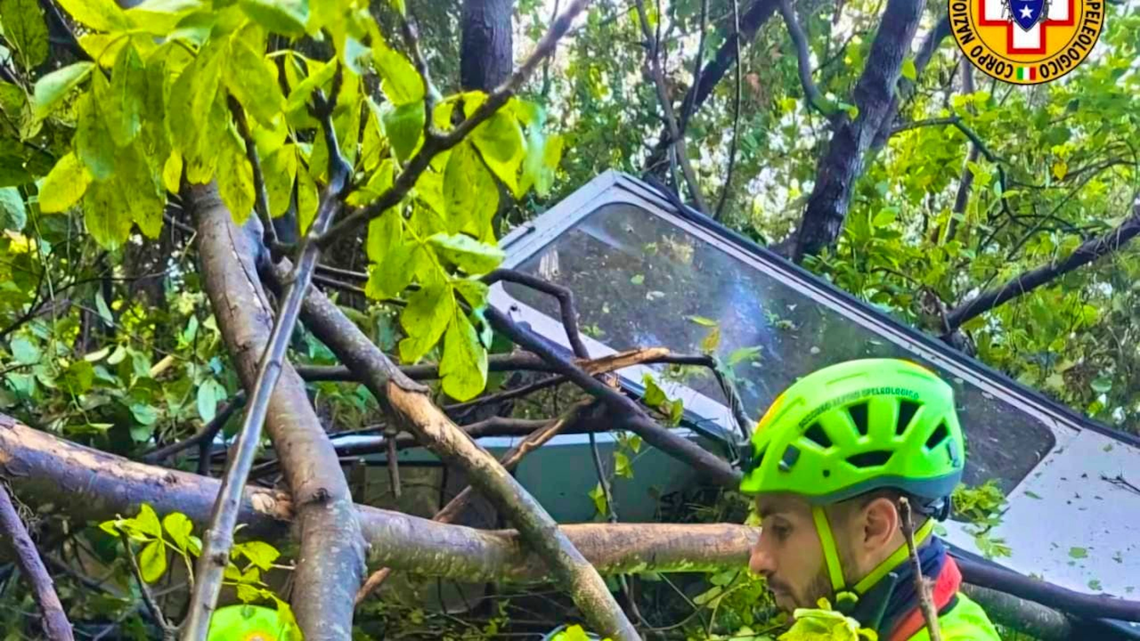 Rescuers work on the smashed gondola in Castellamare di Stabia.