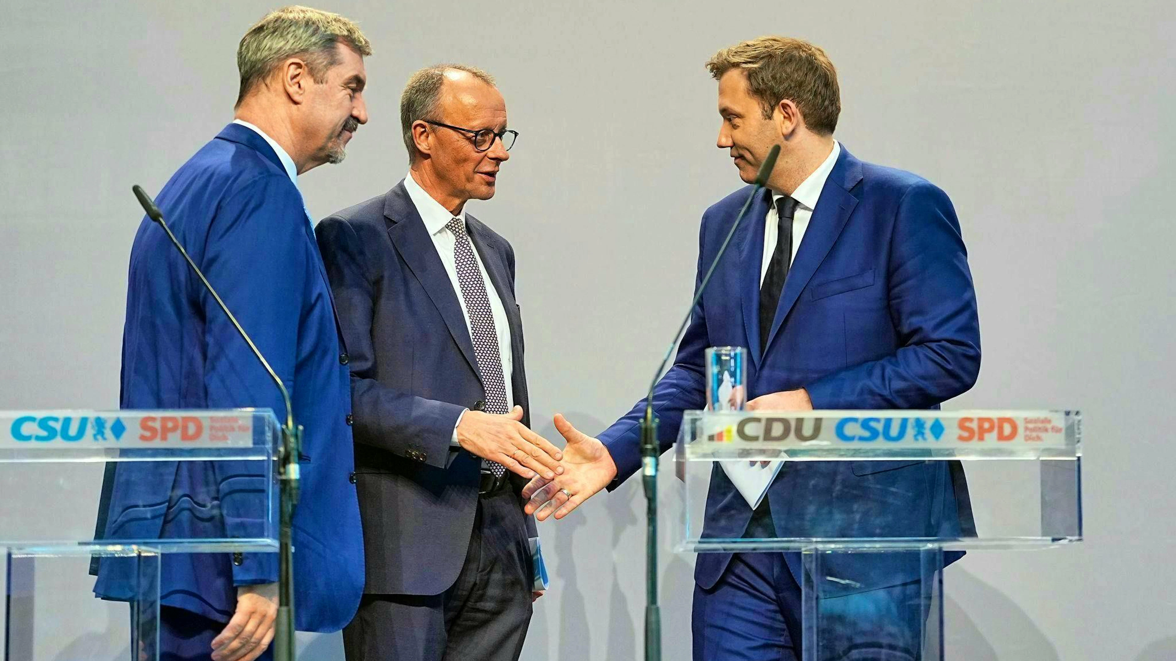 The party leaders of the CSU (Markus Söder, left), CDU (Friedrich Merz, center) and SPD (Lars Klingbeil) present the coalition agreement.
