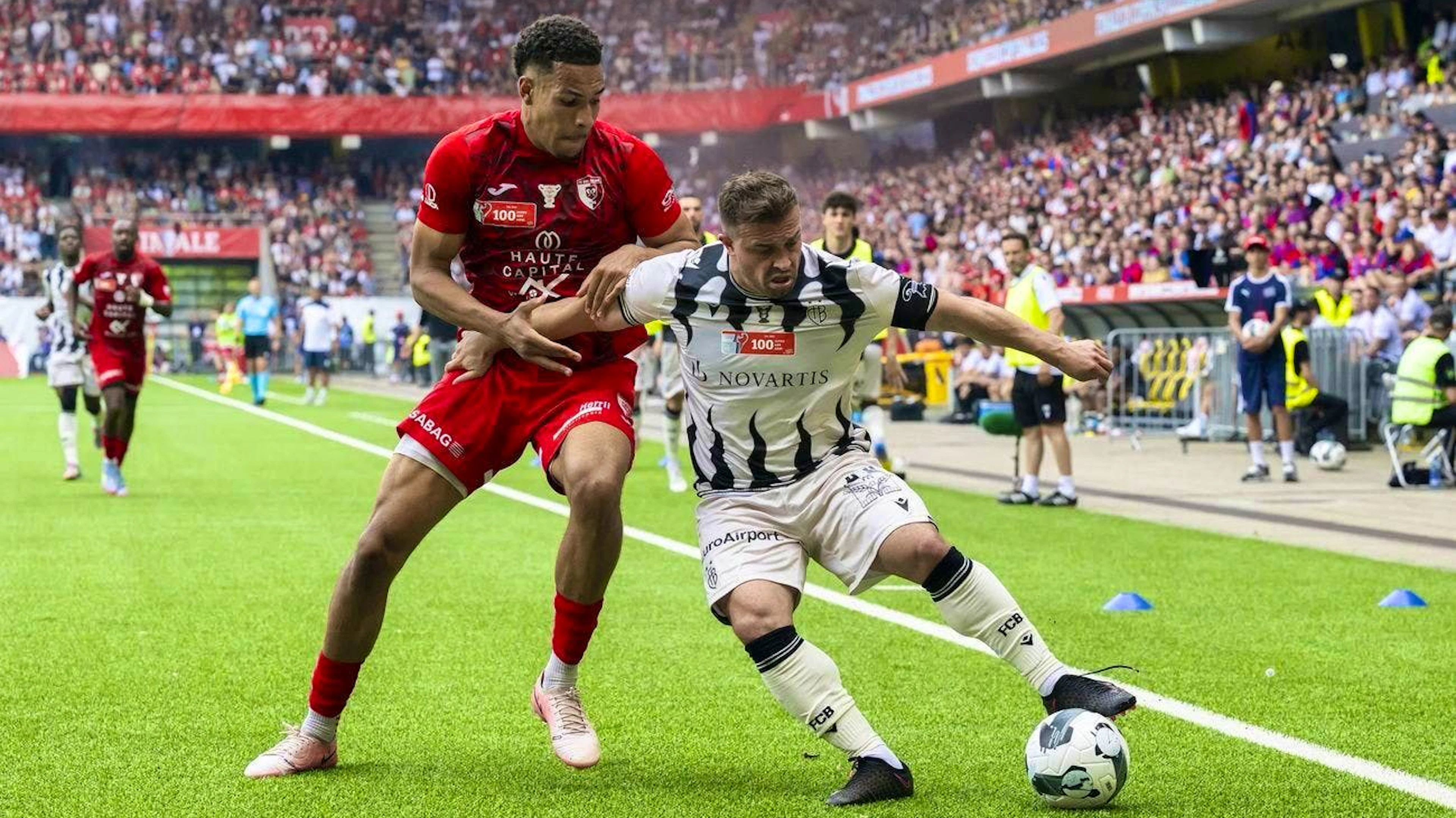 Damian Kelvin (left) will defend in Lugano in future.