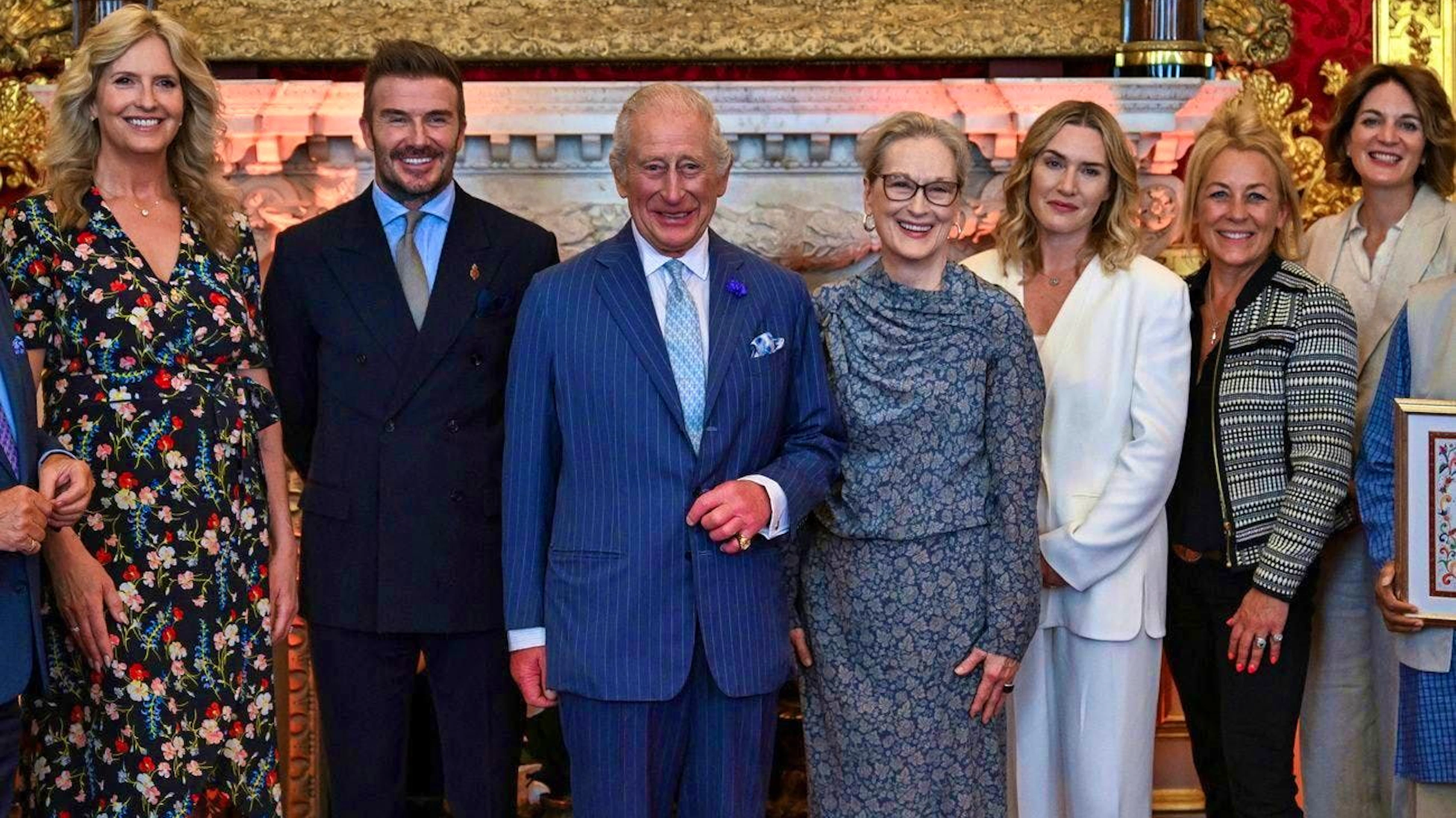 Celebrity round: King Charles poses with football icon David Beckham and Hollywood stars Meryl Streep and Kate Winslet (from left to right).