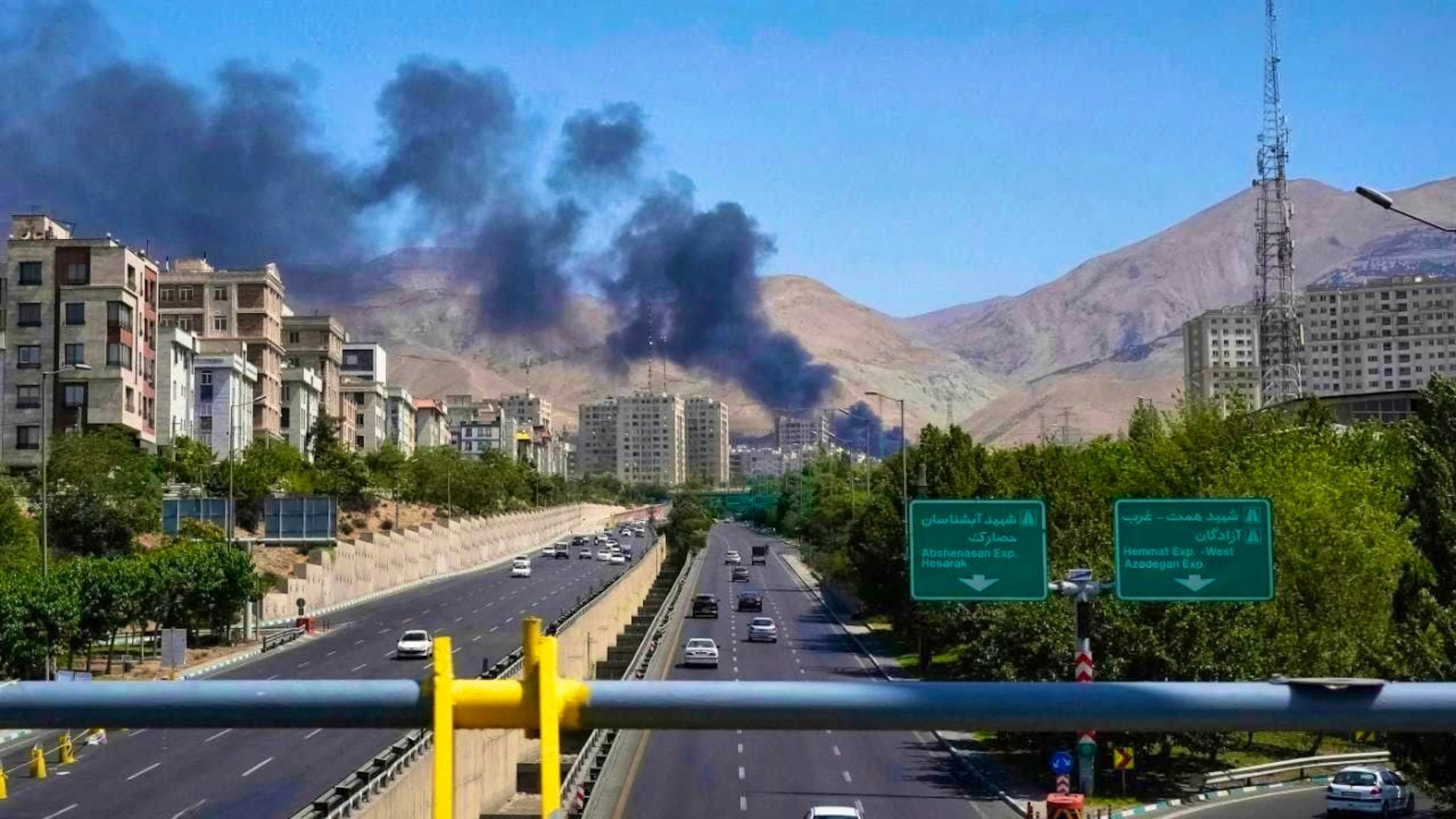 Smoke rises from an oil storage facility in the Iranian capital after it appears to have been hit by an Israeli attack. Photo: Vahid Salemi/AP/dpa