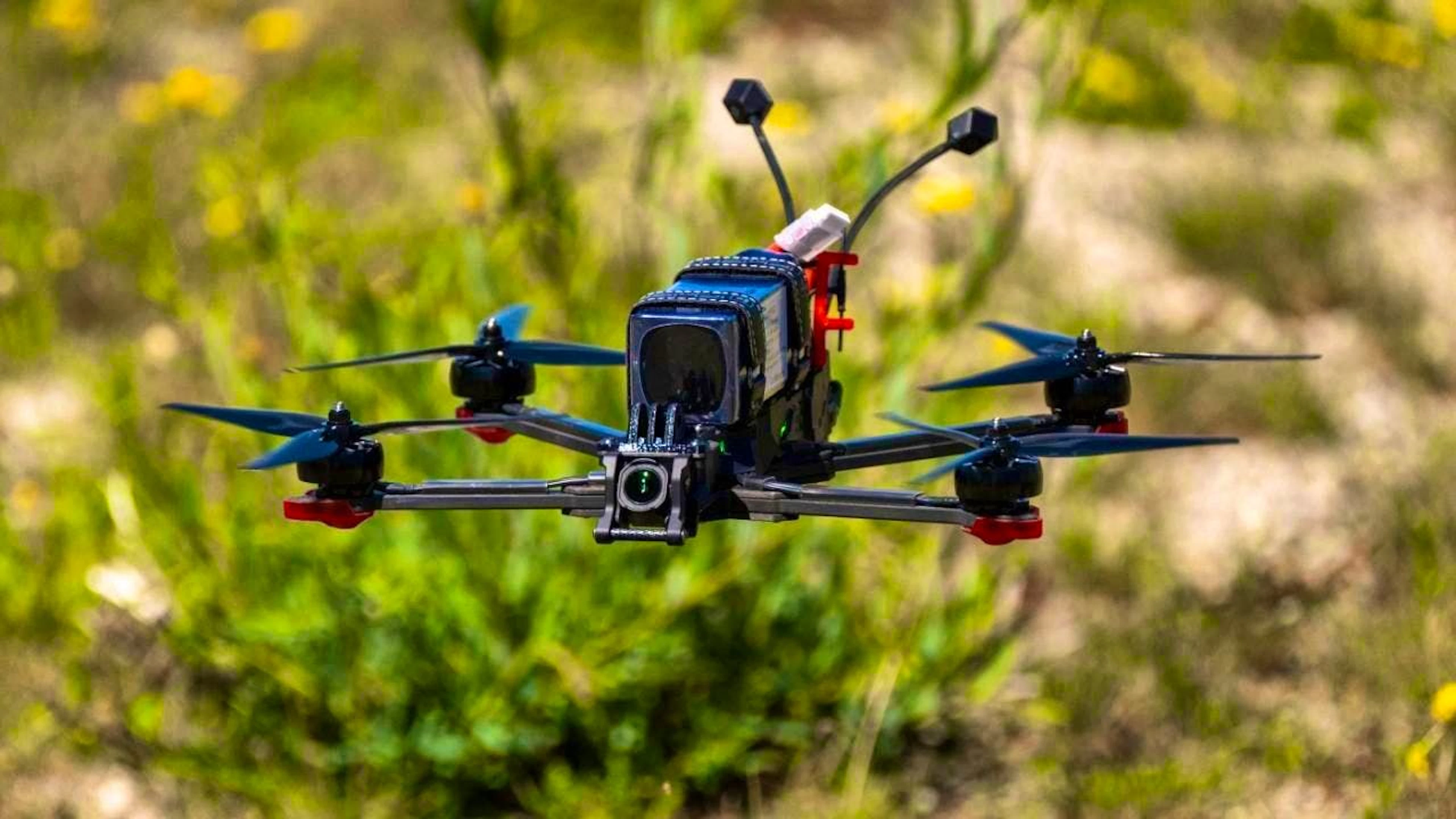A small drone flies. Photo: Peter Kneffel/dpa