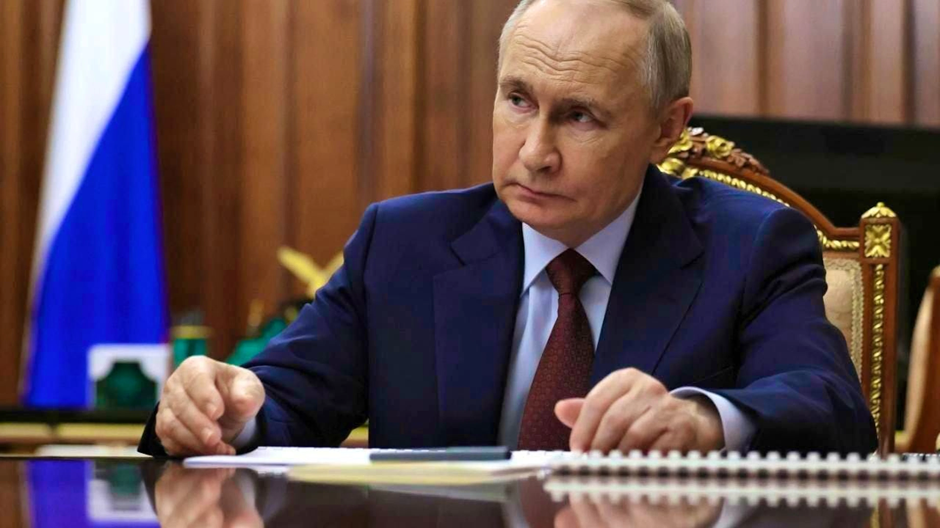 Russian President Vladimir Putin listens to the President of the Russian Academy of Sciences, Krasnikov, during their meeting in the Kremlin. Photo: Mikhail Metzel/Pool Sputnik Kremlin via AP/dpa