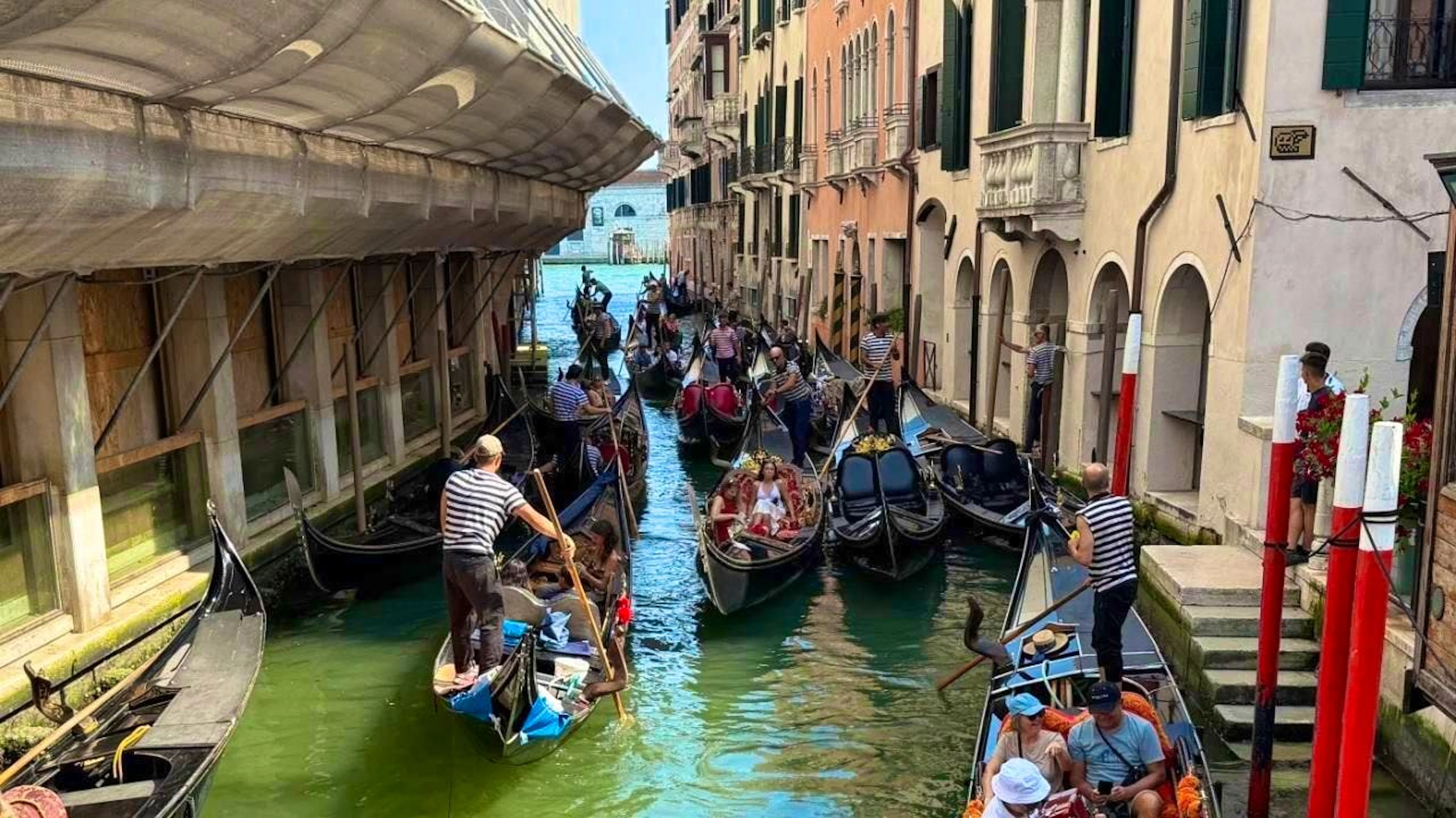 ARCHIVE - Gondolas in one of Venice's canals. Photo: Christoph Sator/dpa
