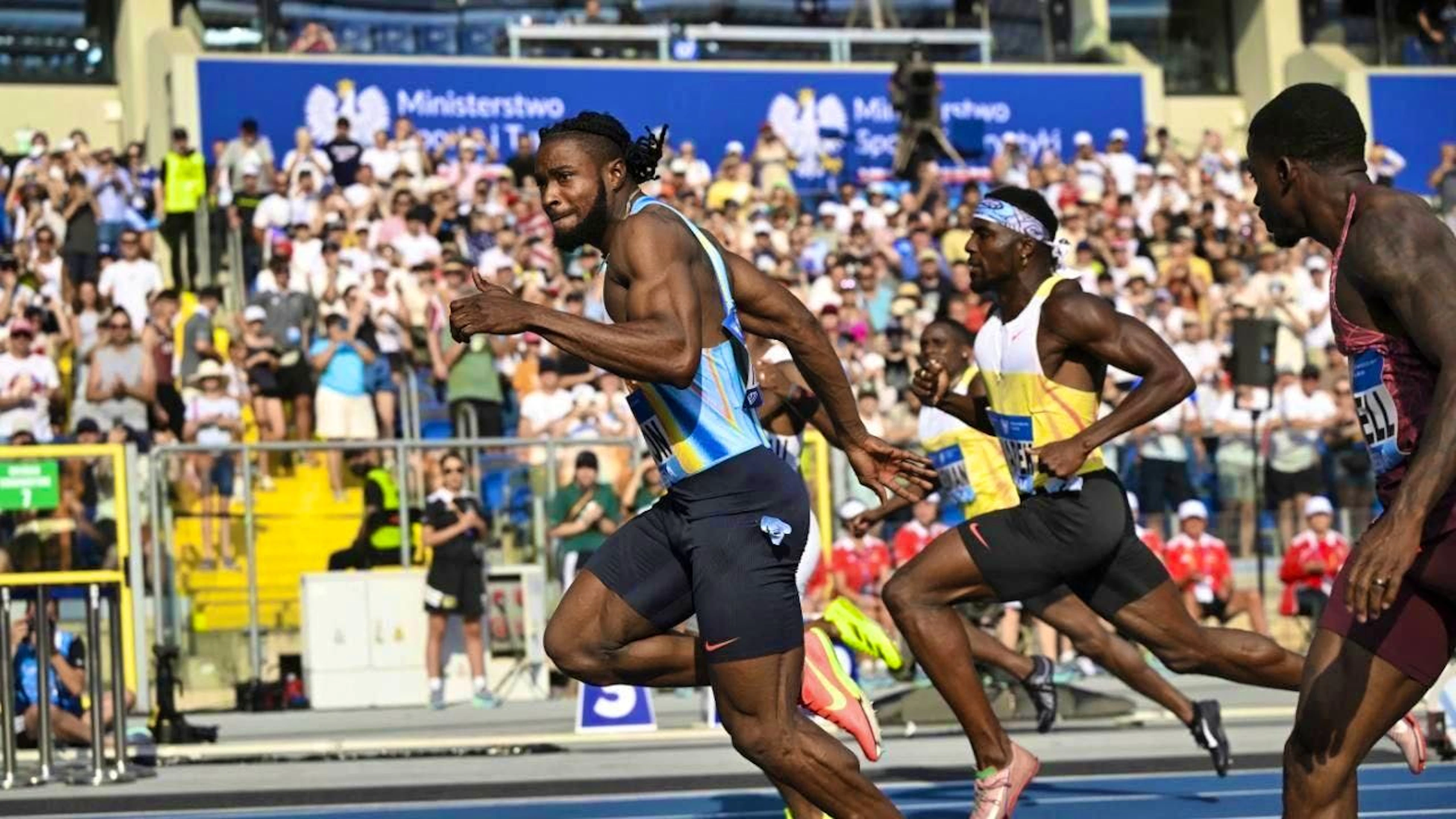 Kishane Thompson from Jamaica crosses the finish line first at the Diamond League meeting in Poland