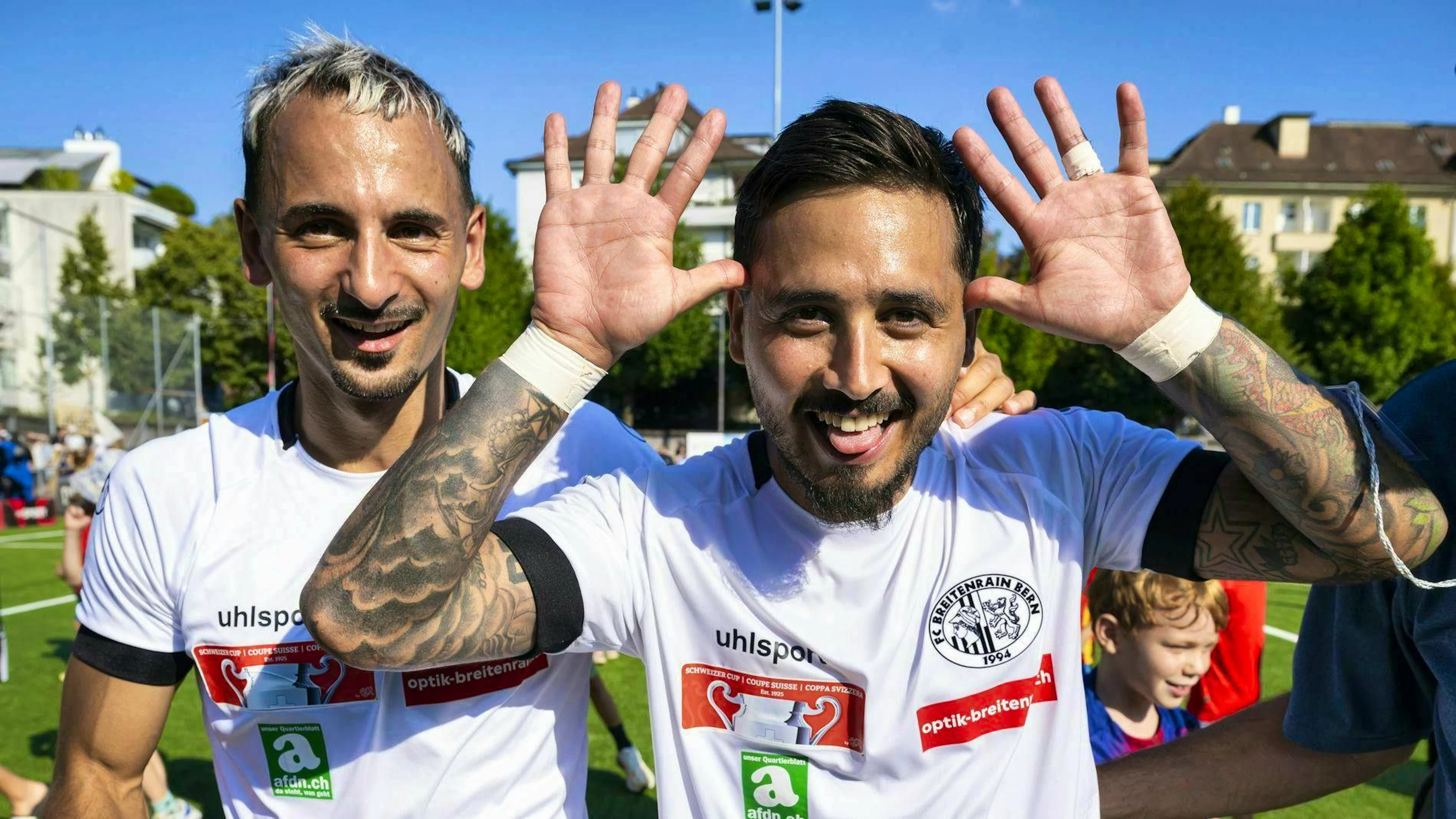 Adrian Fleury (Breitenrain), left, and Neto Gomes Antero Da Silva (Breitenrain), right, celebrate after the victory (1-0) in the first round of the Swiss Cup football match between FC Breitenrain and FC Thun.