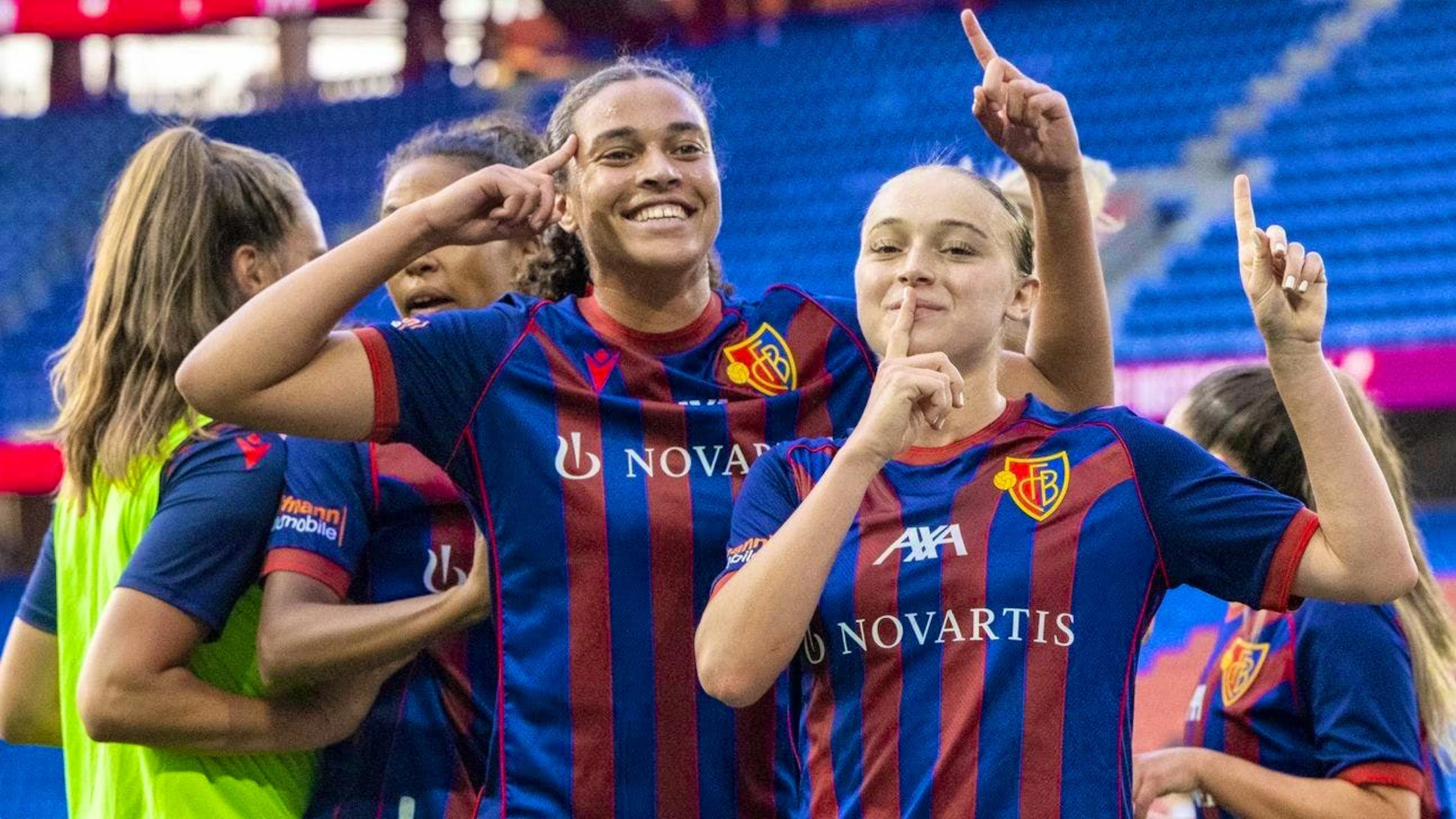 Basel with Melissa Chidera Ugochukwu, center, and Lia Kamber, right, celebrate the 2:0 goal during the Women's Super League match between FC Basel and FC Aarau.