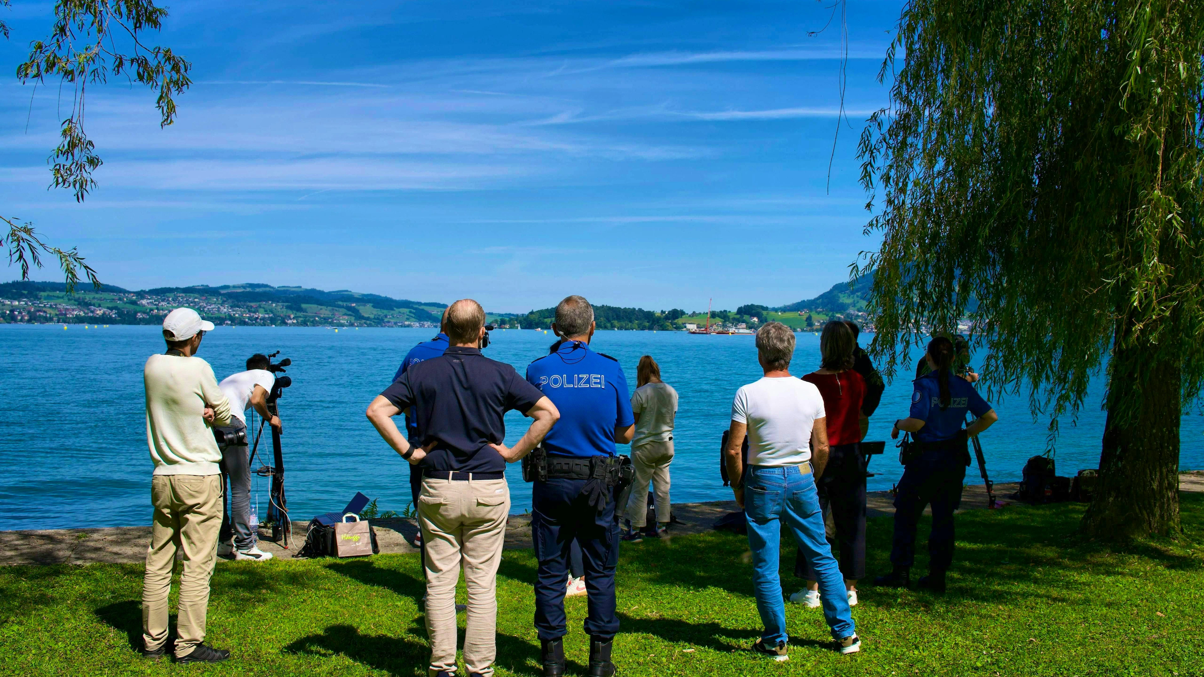 Members of the press and police kept a close eye on the rescue operation.
