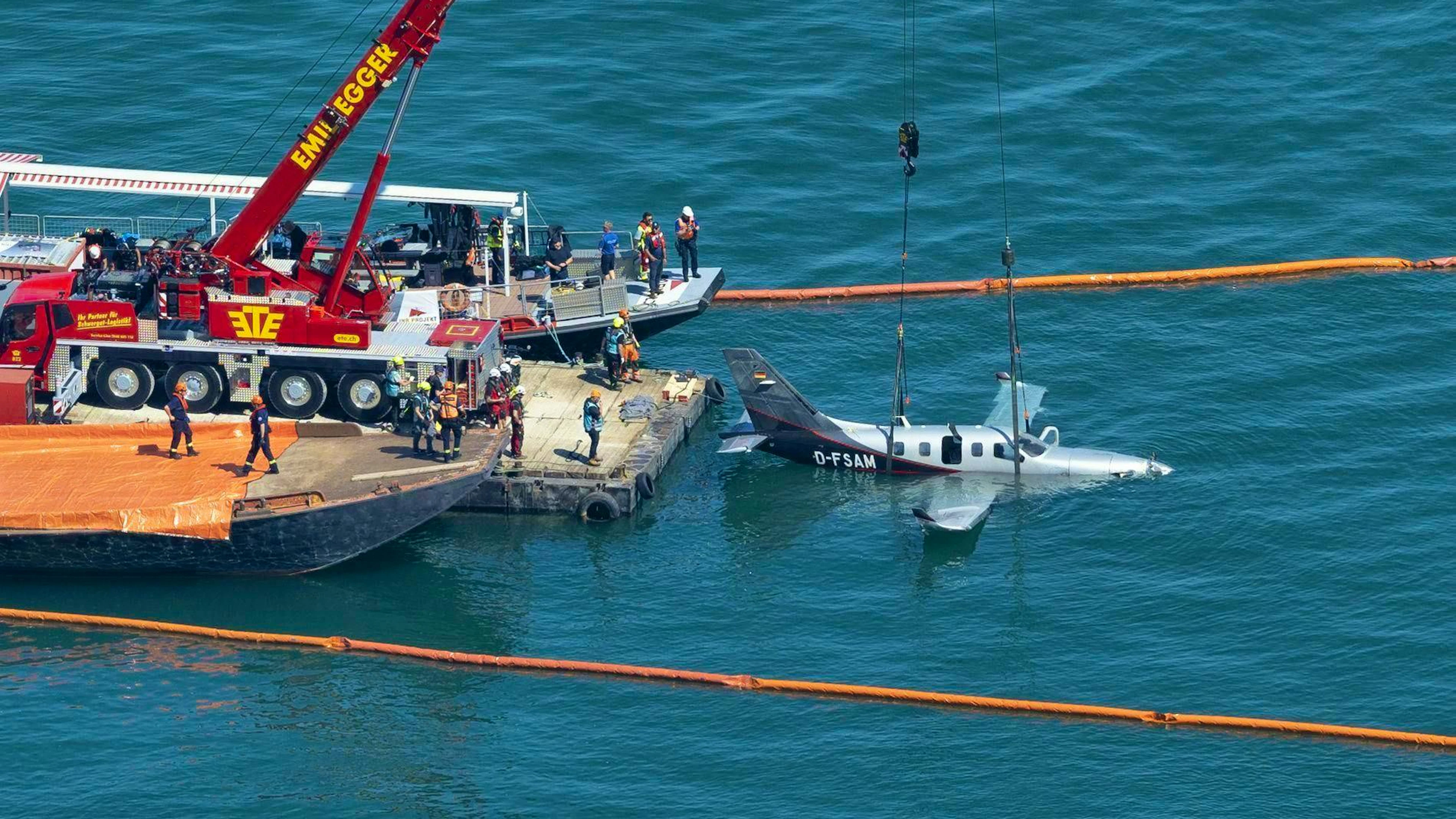 Before the plane could be lifted completely out of the water, divers had to drill holes in the aircraft.